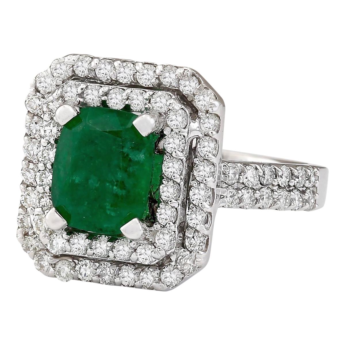 3.59 Carat Natural Emerald 14 Karat White Gold Diamond Ring
Stamped: 14K White Gold
Total Ring Weight: 7.7 Grams
Total Natural Emerald Weight is 2.43 Carat (Measures: 9.00x7.00 mm)
Color: Green
The Total Natural Diamond Weight is 1.16 Carat
Color: