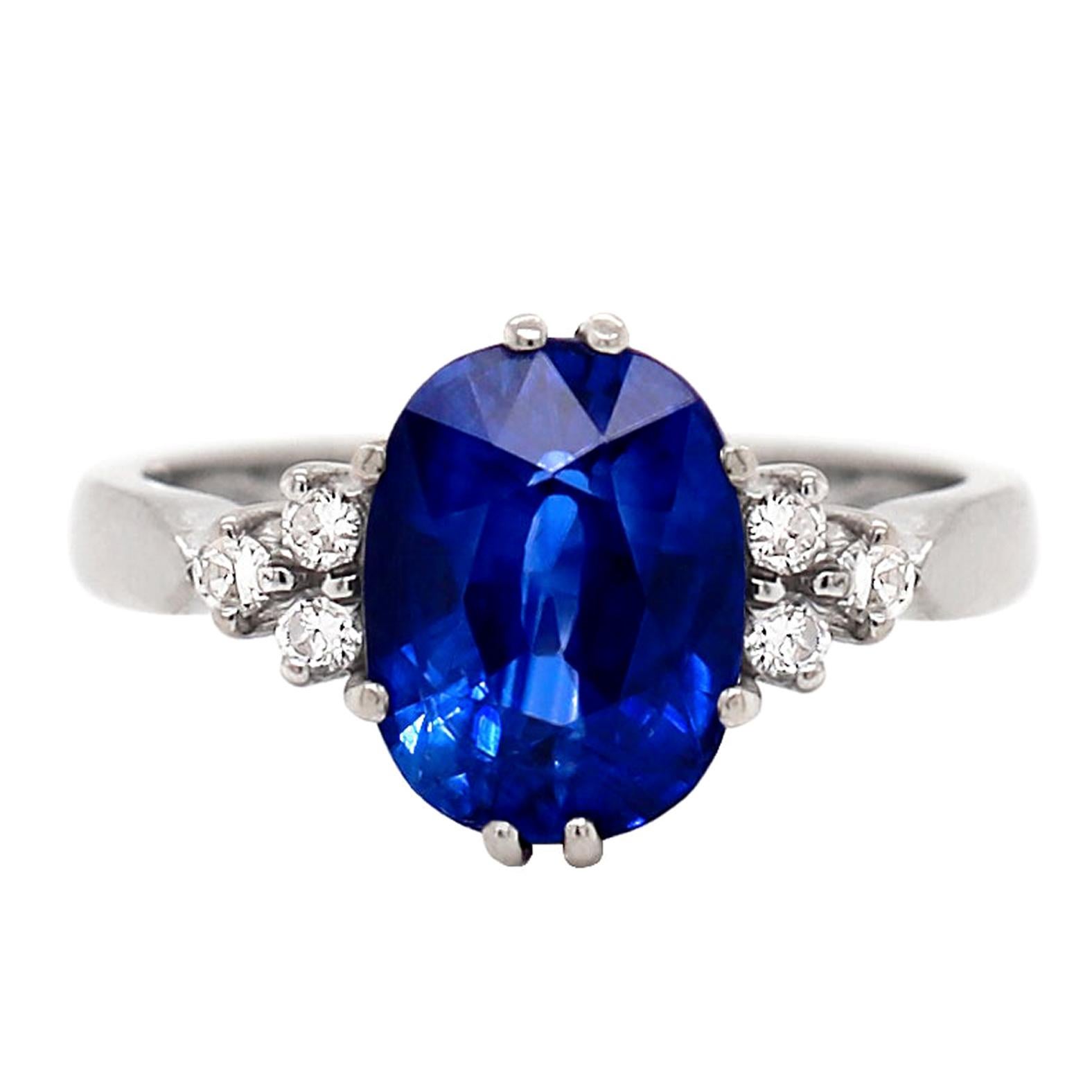 3.59 Carat Oval Sapphire and Diamond 18ct White Hold Engagement Ring For Sale