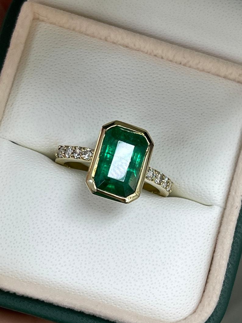 3.59tcw 14K Emerald Cut Emerald & Diamond Ring - Deep Green Bezel Set Design For Sale 2