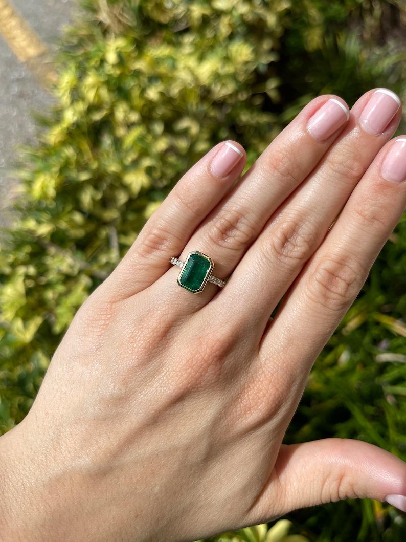 3.59tcw 14K Emerald Cut Emerald & Diamond Ring - Deep Green Bezel Set Design For Sale 3