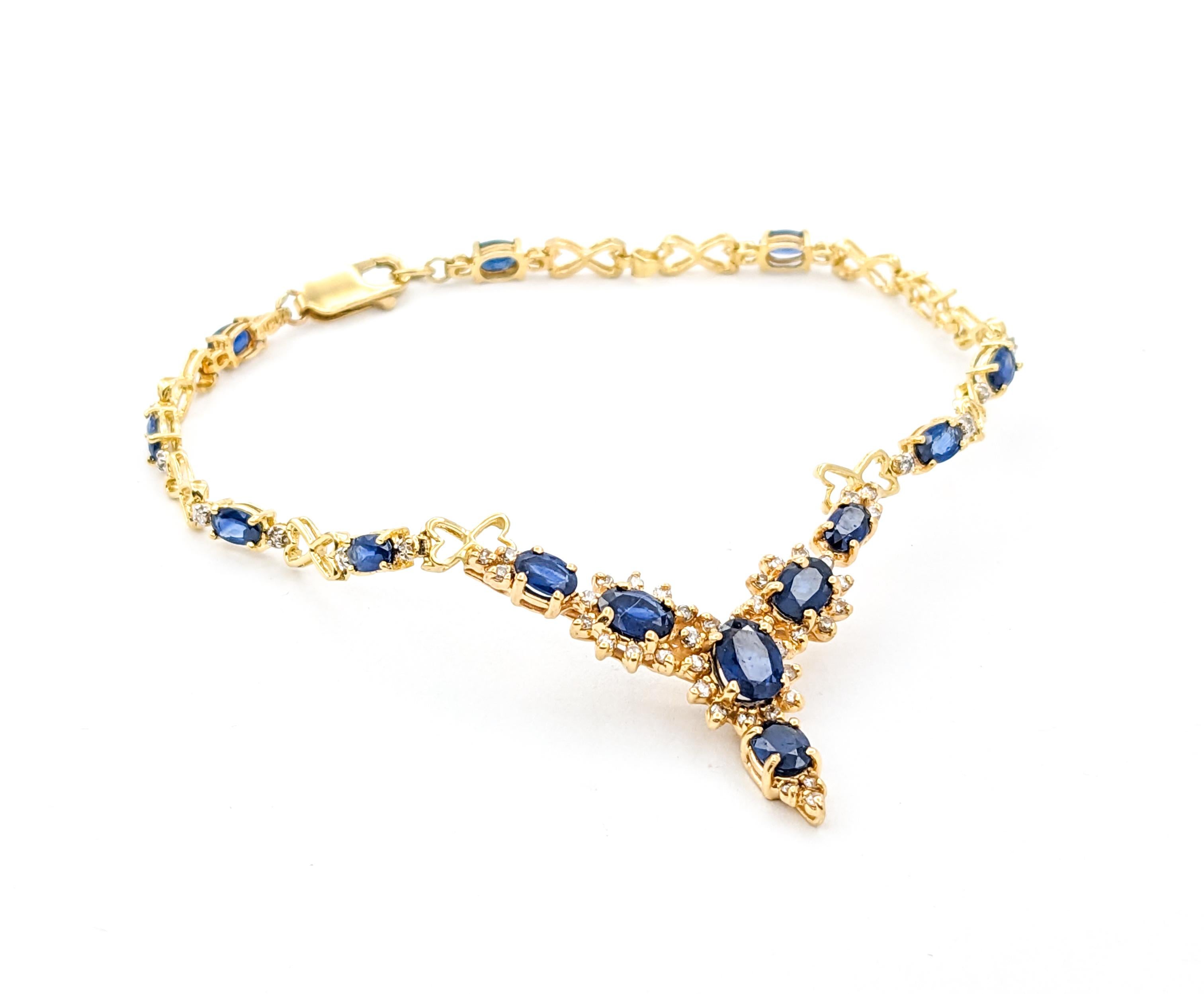 3.5ctw Sapphire & Diamond Bracelet In Yellow Gold

Discover the timeless elegance of this stunning bracelet, exquisitely crafted in 14kt yellow gold. This luxurious piece is adorned with .33ctw of radiant round diamonds, each boasting I clarity and