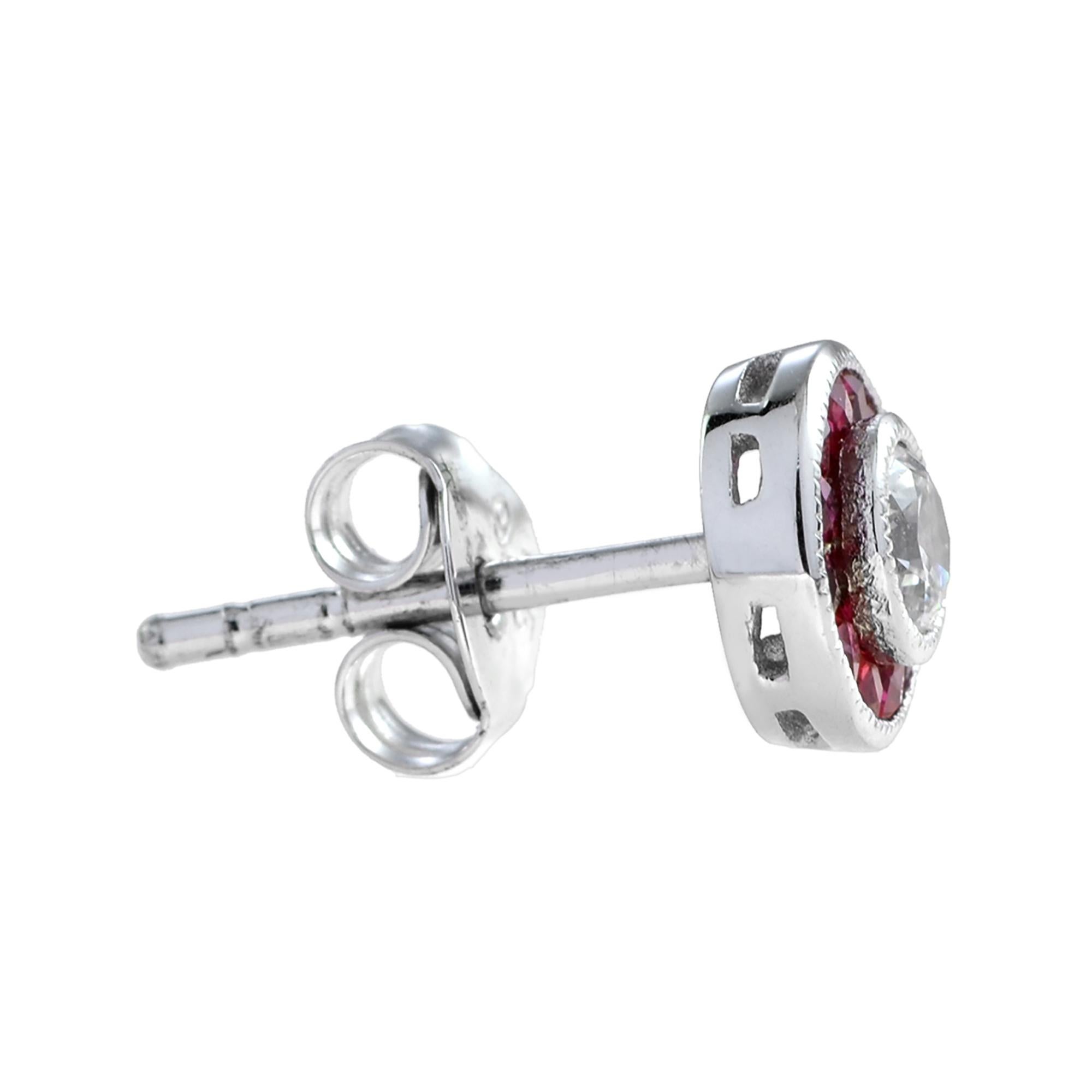 These Art-Deco stud earrings are completely spectacular! The vibrant color stone (you can select Blue Sapphire, Emerald, Ruby) is a specialty cut to surround the excellent round brilliant cut center diamond, which is in a thin bezel with millgrain