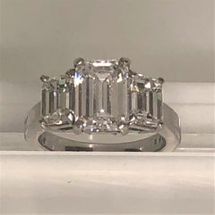 3.6tdw+ Platinum 3 Diamond Emerald Cut Ring