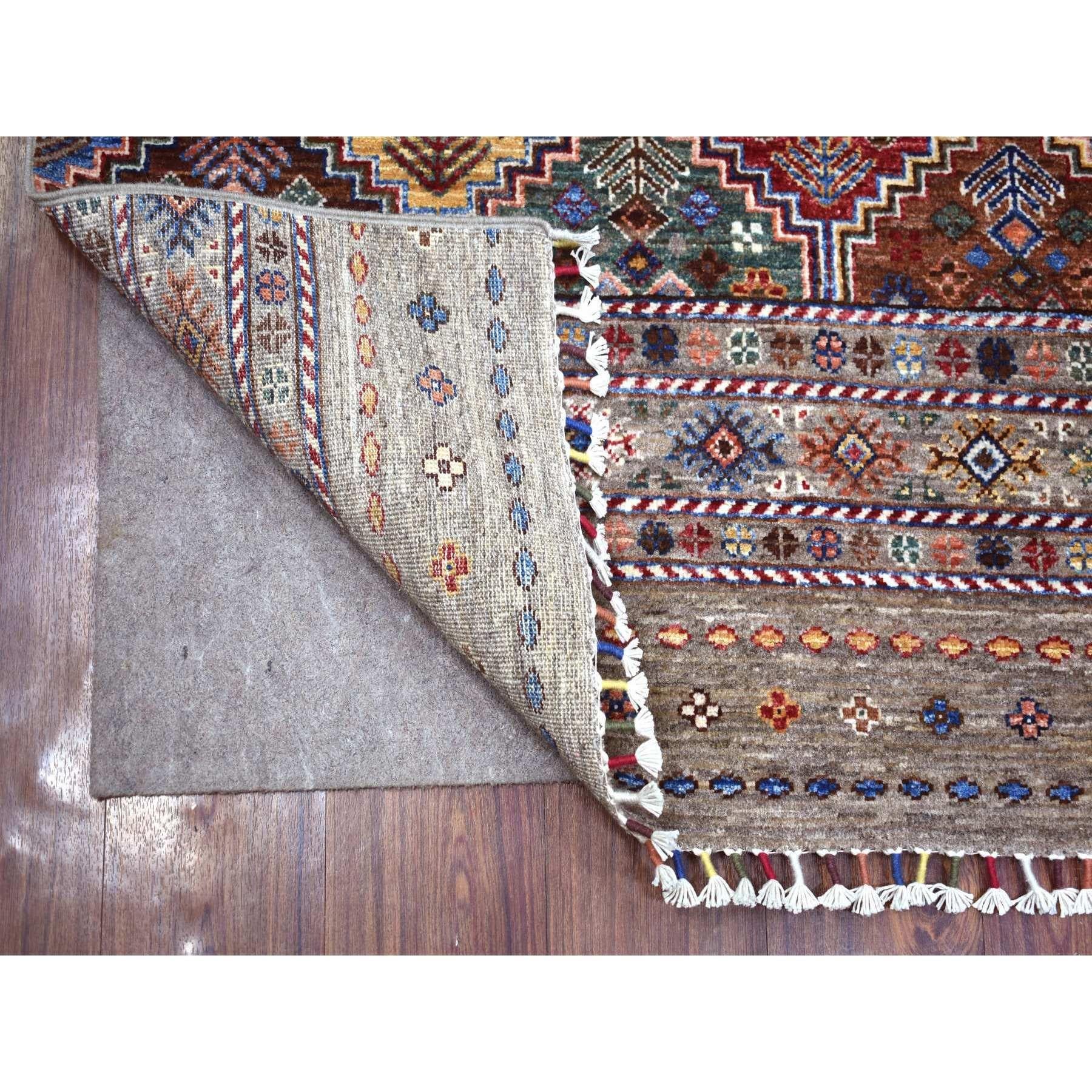 This is a truly genuine one-of-a-kind Taupe Gray Natural Dyes Afghan Super Kazak with Khorjin Design Densely Woven Soft Wool, Hand Knotted, Runner Oriental Rug. It has been Knotted for months and months in the centuries-old weaving craftsmanship