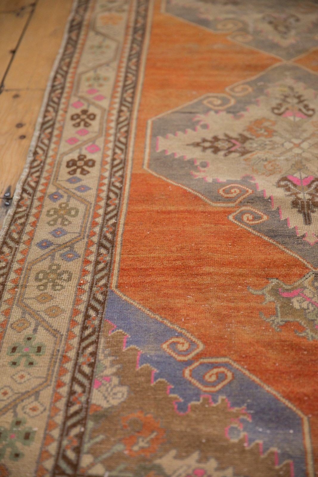 Mid-20th Century Vintage Distressed Oushak Rug Runner For Sale