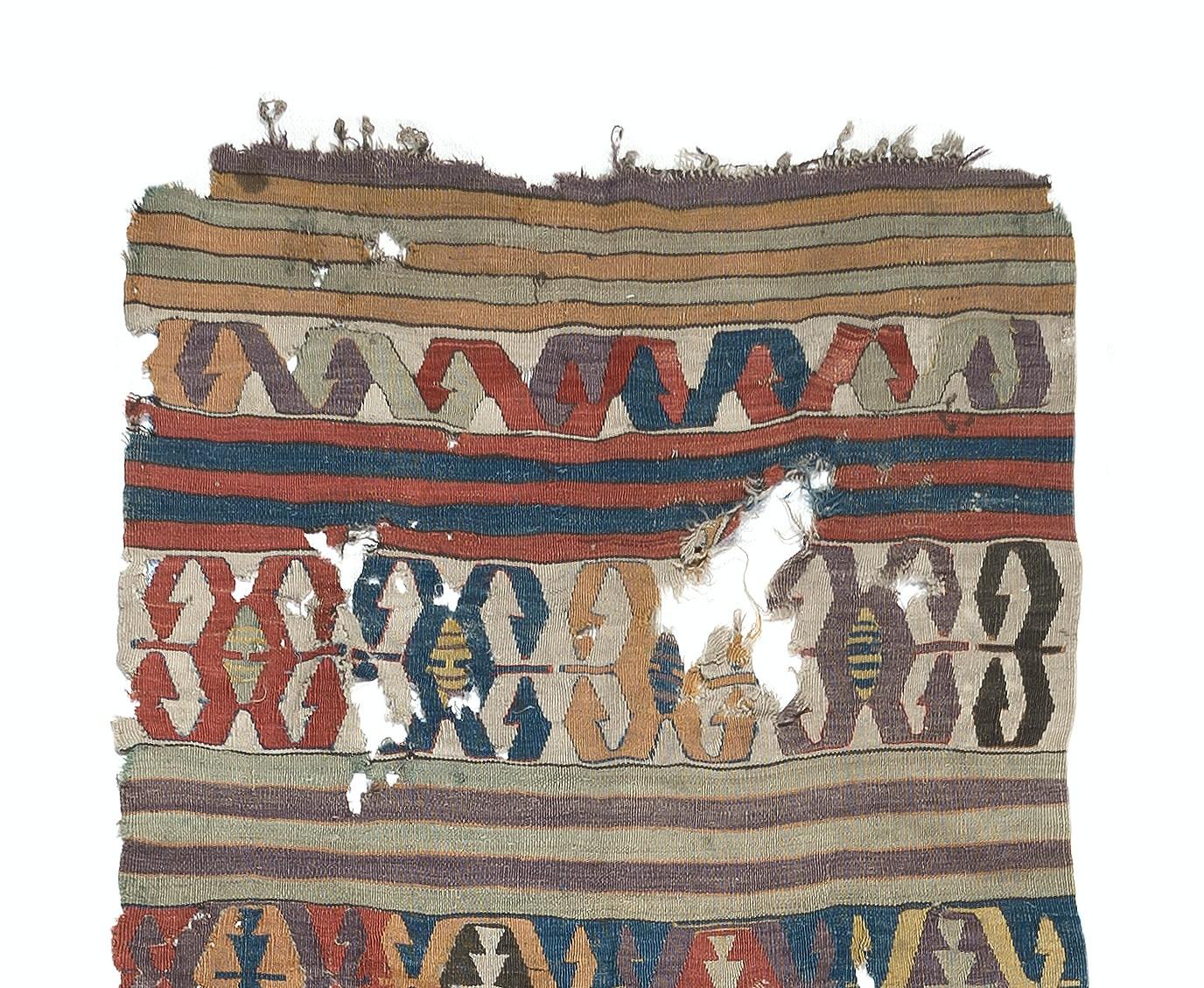 Embark on a journey through time and tradition with this exquisite Antique Anatolian Karapinar fragment distressed kilim, a rare artifact dating back to the 18th century. Crafted with meticulous skill and artistry by Anatolian weavers over three