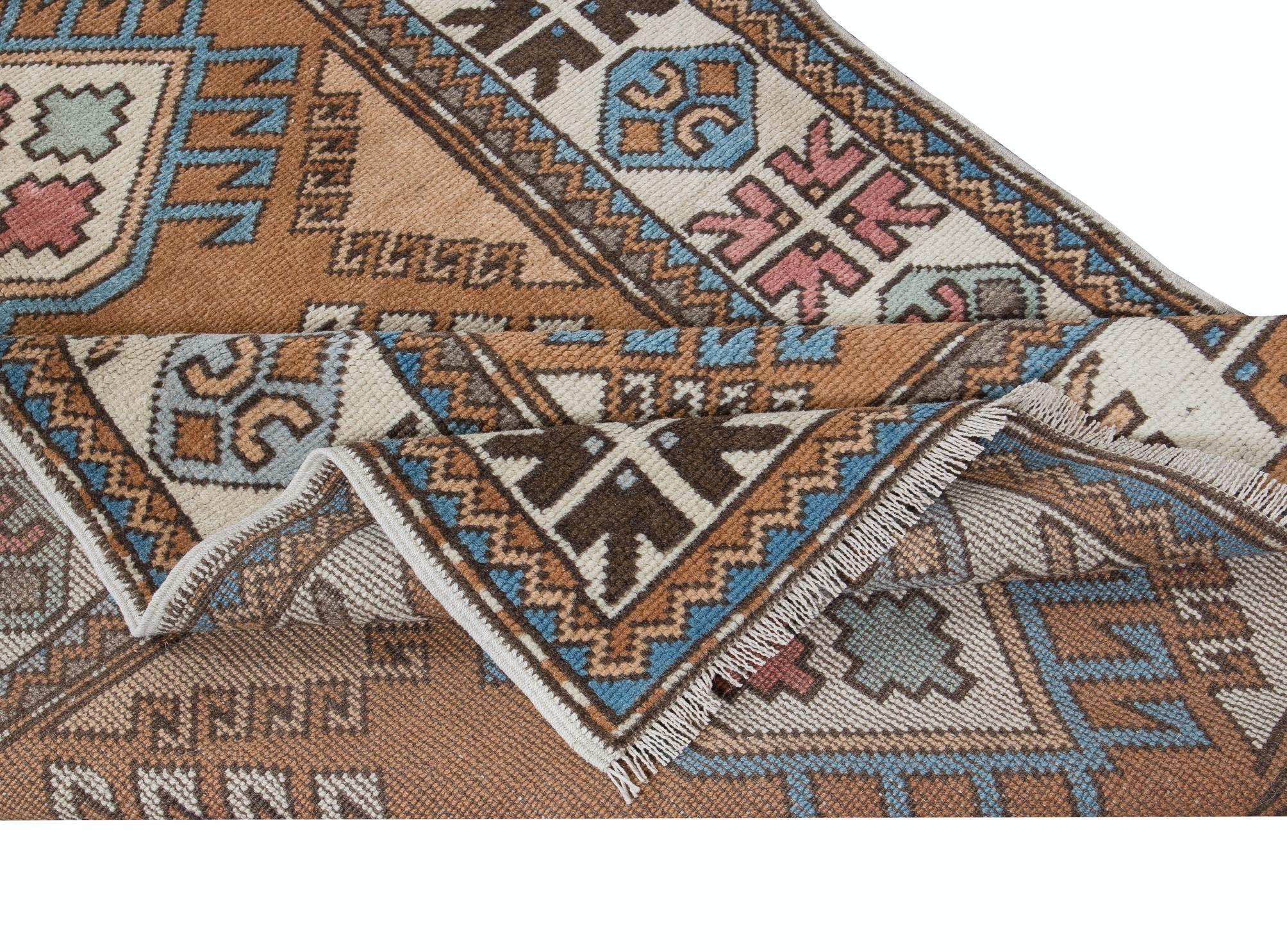 A hand-knotted contemporary Turkish runner rug.

This modern rug has even medium wool pile on wool foundation.

It is made of premium hand-spun sheep and natural dyes, ie. plant based non chemical dyes making it sought after, rare and special. 

The