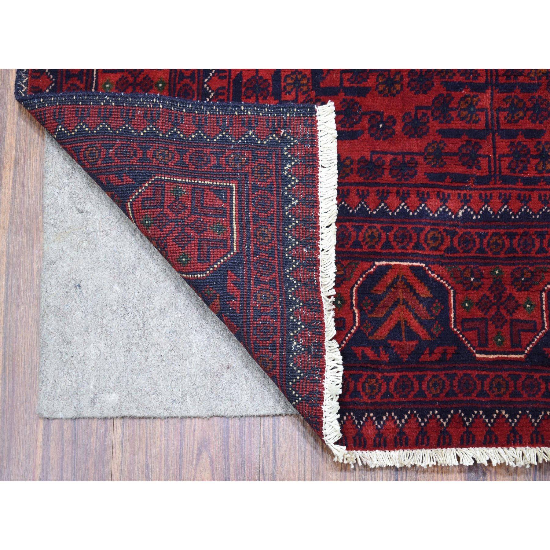 This is a truly genuine one-of-a-kind Saturated Red Afghan Khamyab with All Over Design Hand Knotted Soft, Velvety Wool Oriental Rug. It has been Knotted for months and months in the centuries-old weaving craftsmanship techniques by expert