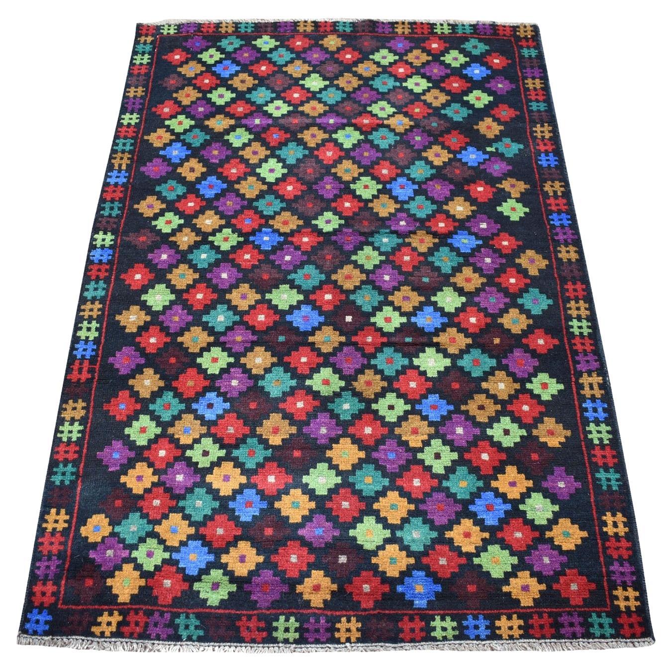 3
5 "x5
Tapis d
Orient en laine colorée Afghan Baluch All Over Design, noué à la main