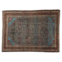 Tapis Malayer vintage vieilli en mauvais état