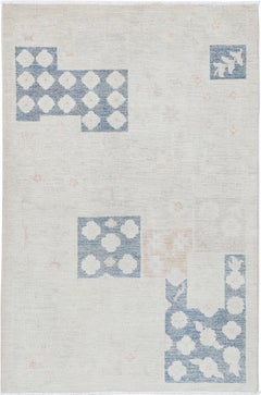 3.5x5.2 ft Hand Knotted Ivory, Blue, Blush Wool Accent Rug with Geometric Design