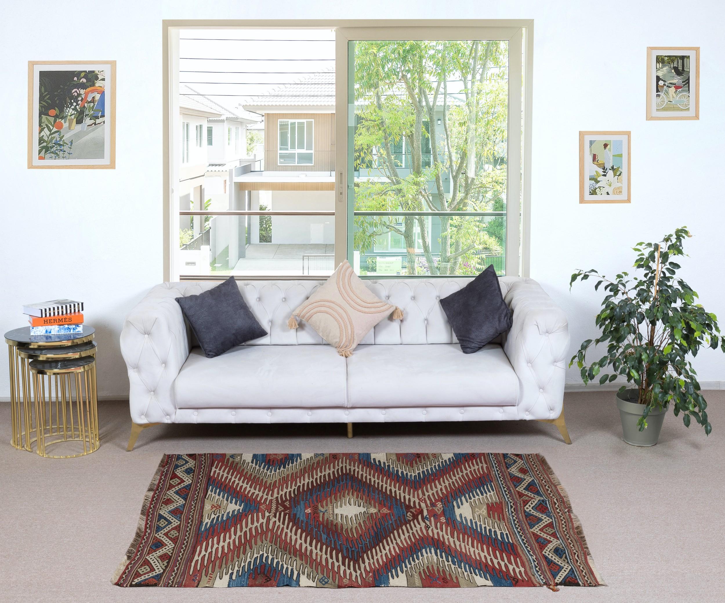 Embark on a journey through Turkish tradition with this exquisite vintage handwoven Afyon Dakiri kilim rug, a testament to the enduring craftsmanship of Anatolian artisans. Woven with meticulous care and attention to detail, this kilim rug