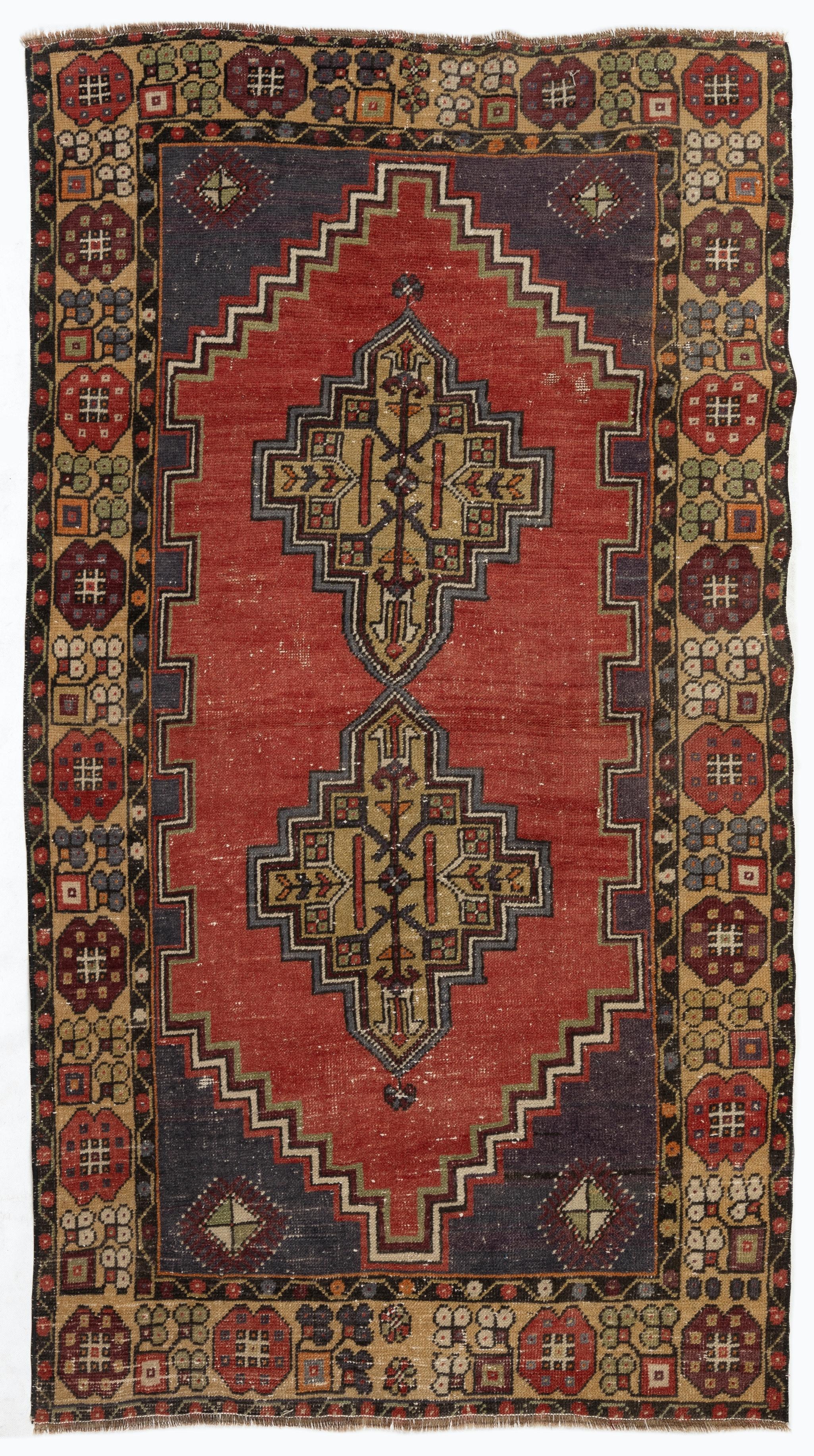 Vintage Turkish accent rug. Finely hand-knotted with even medium wool pile on wool foundation. Very good condition. Sturdy and as clean as a brand new rug (deep washed professionally). 
Size: 3.5 x 5.7 ft.