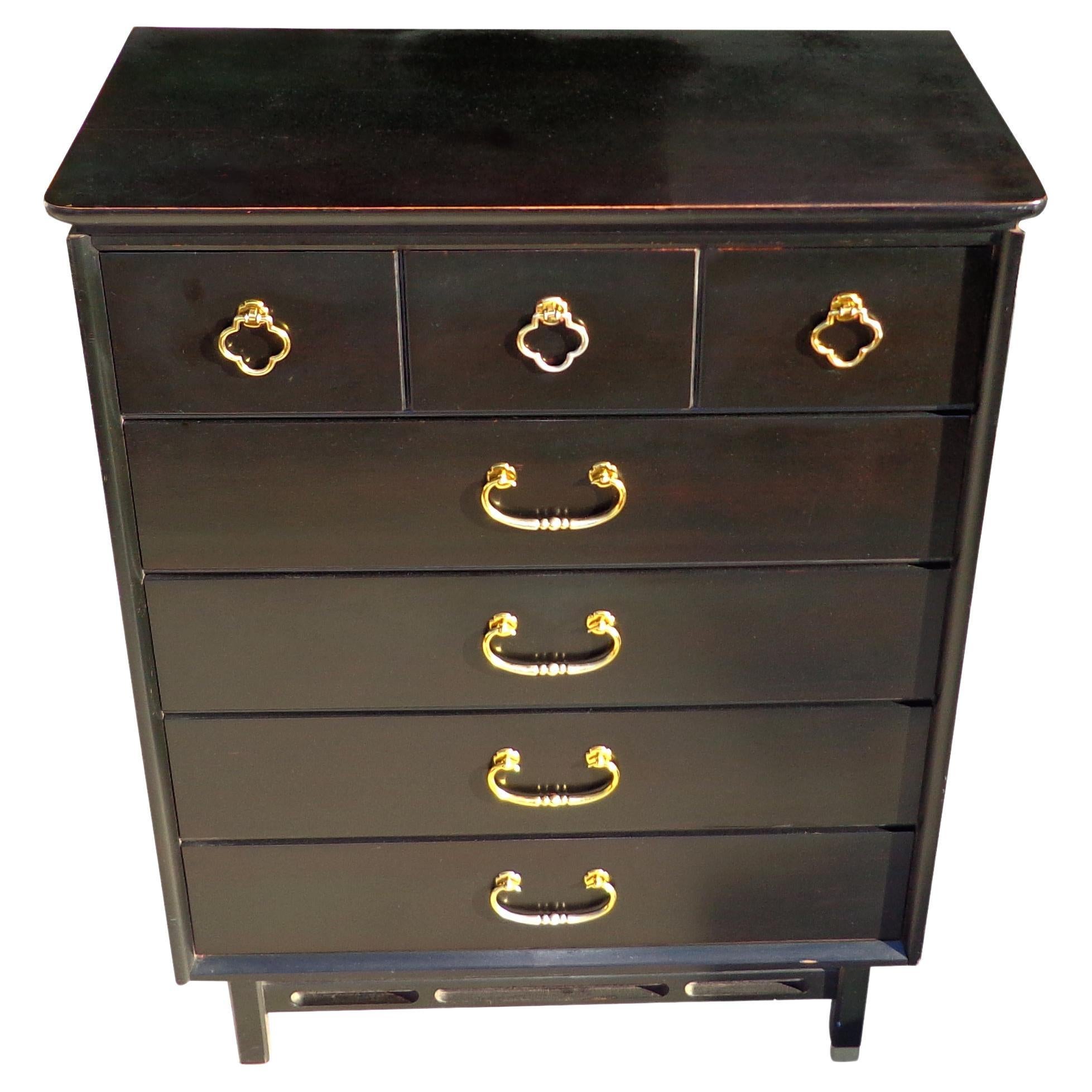 Chin Hua Hollywood Regency Ebonized Dresser by Bassett

Hollywood Regency dresser or credenza in an ebony lacquer finish. Features five large storage drawers with brass finished pulls.

See complimentary dresser available in last photo.