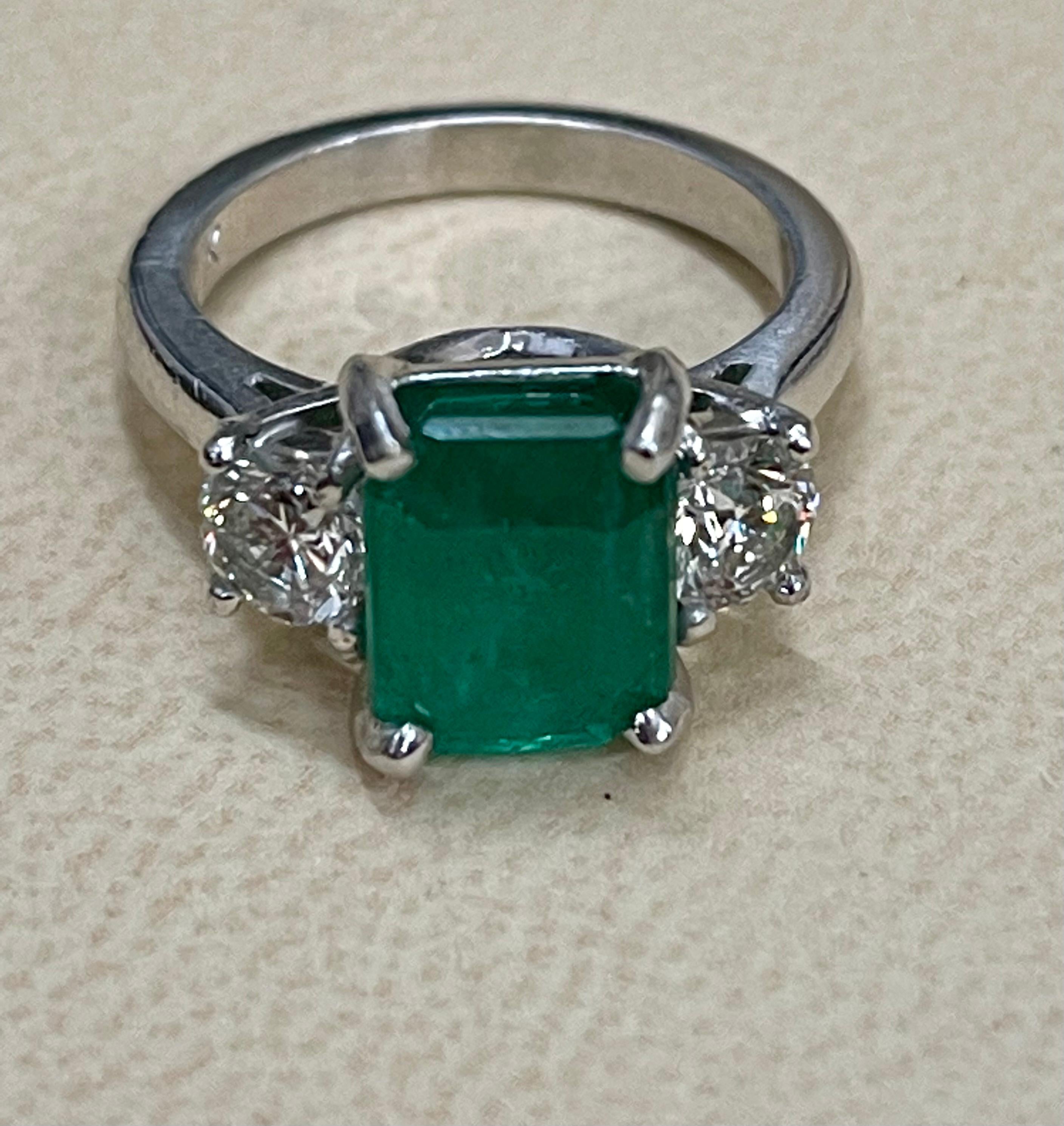 3.6 Carat Emerald Cut Emerald and 1.06 Carat Diamond Ring Platinum 9