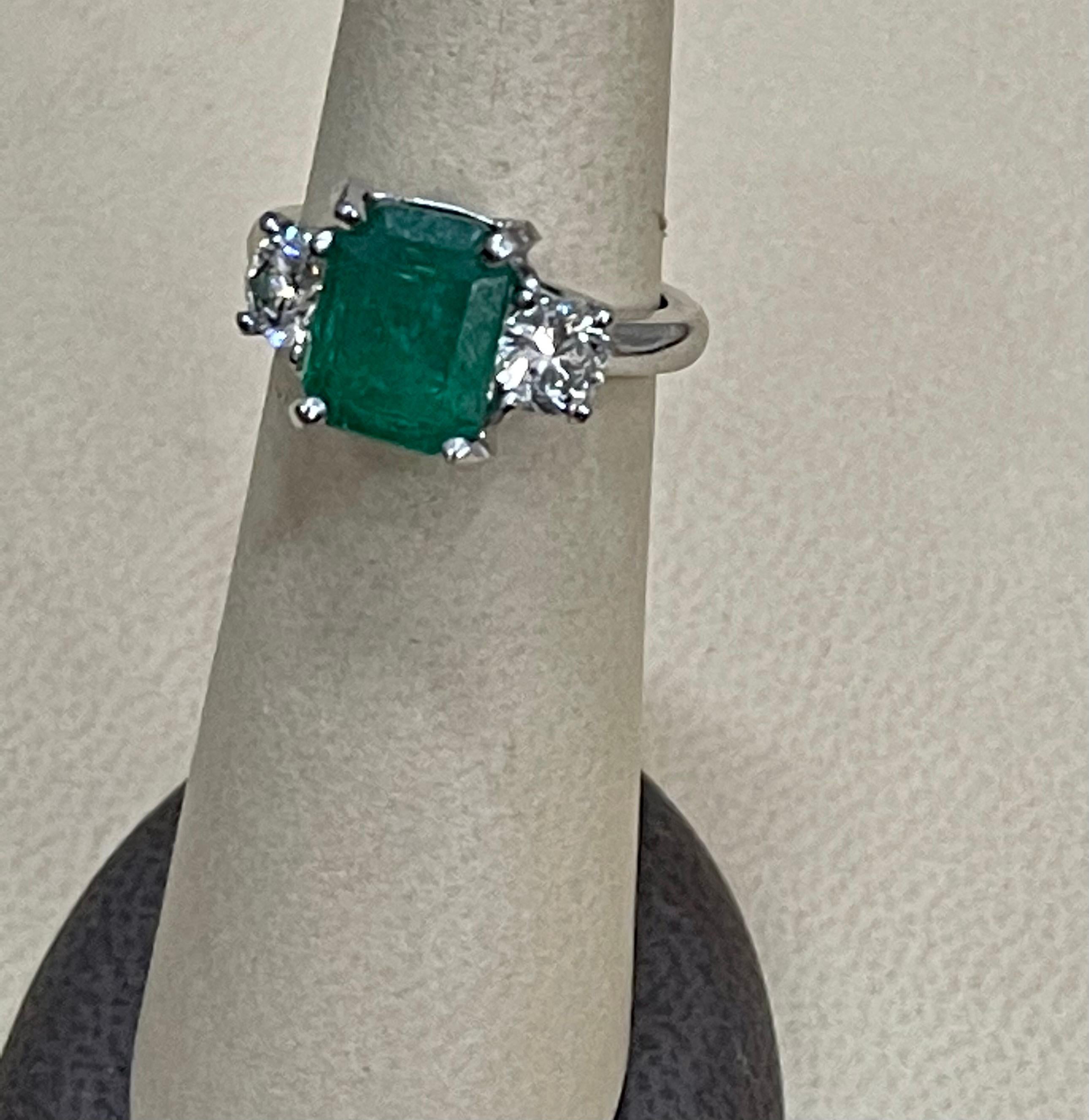 3.6 Carat Emerald Cut Emerald and 1.06 Carat Diamond Ring Platinum 11