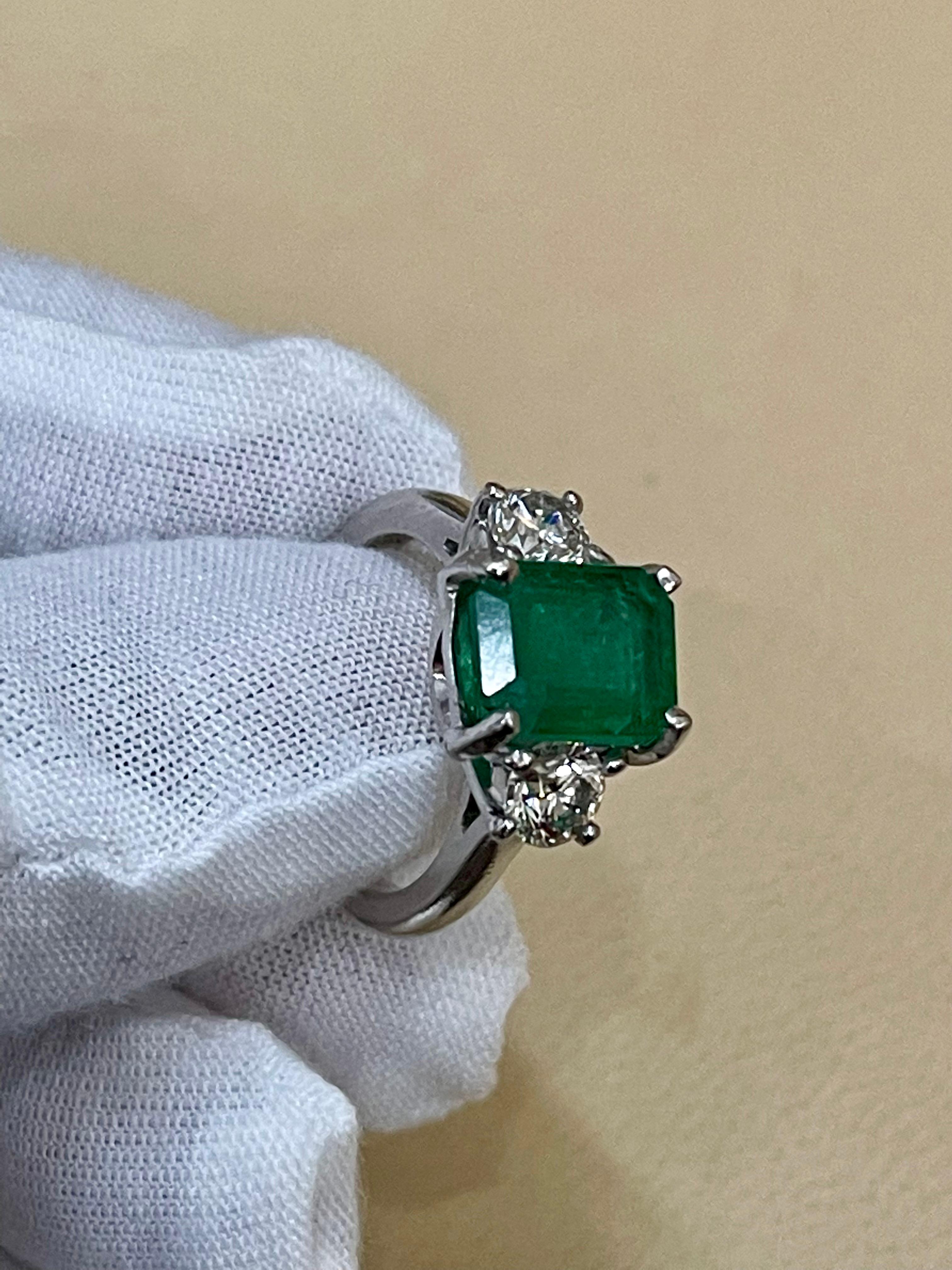 3.6 Carat Emerald Cut Emerald and 1.06 Carat Diamond Ring Platinum 12