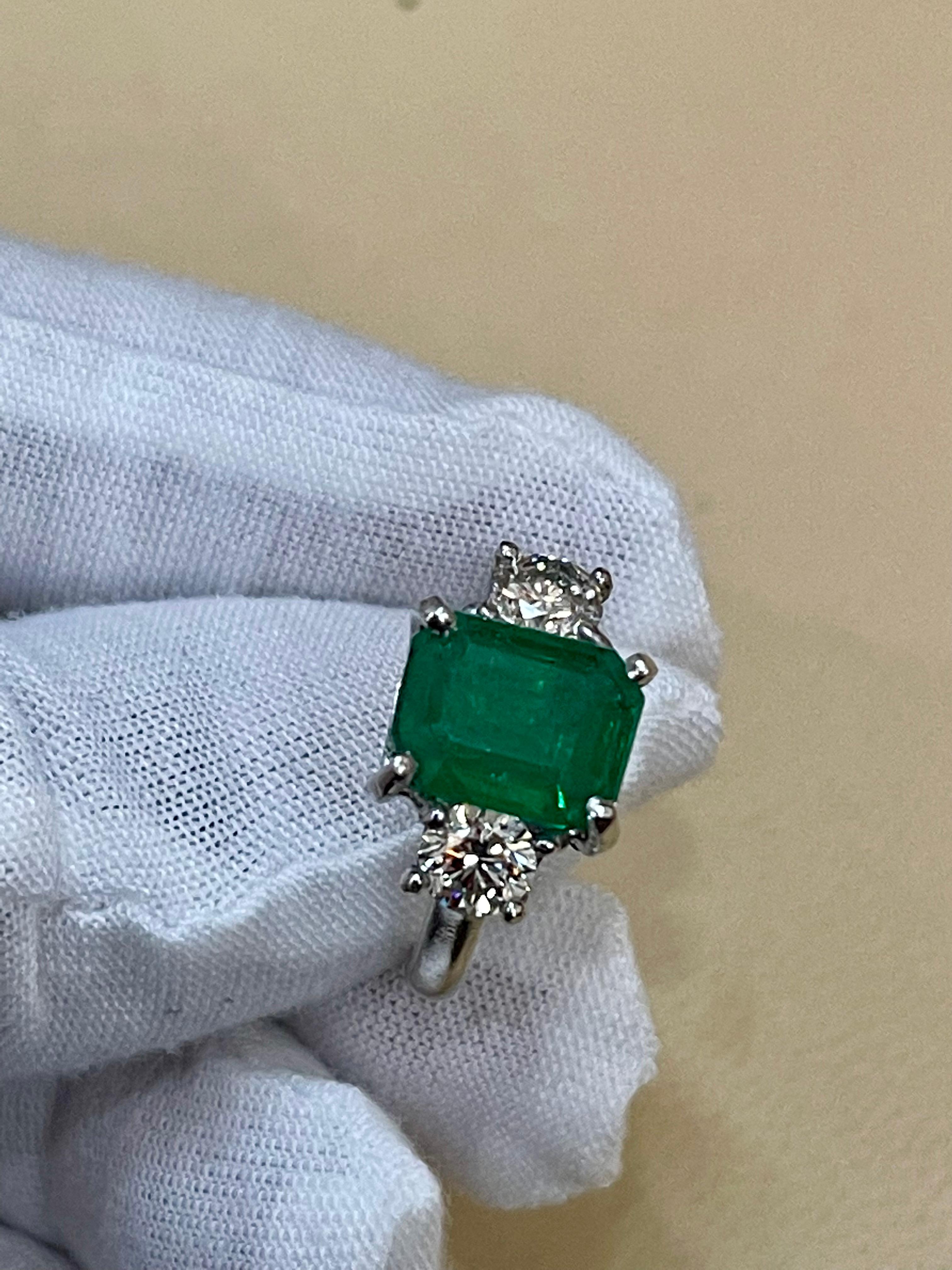 3.6 Carat Emerald Cut Emerald and 1.06 Carat Diamond Ring Platinum 13