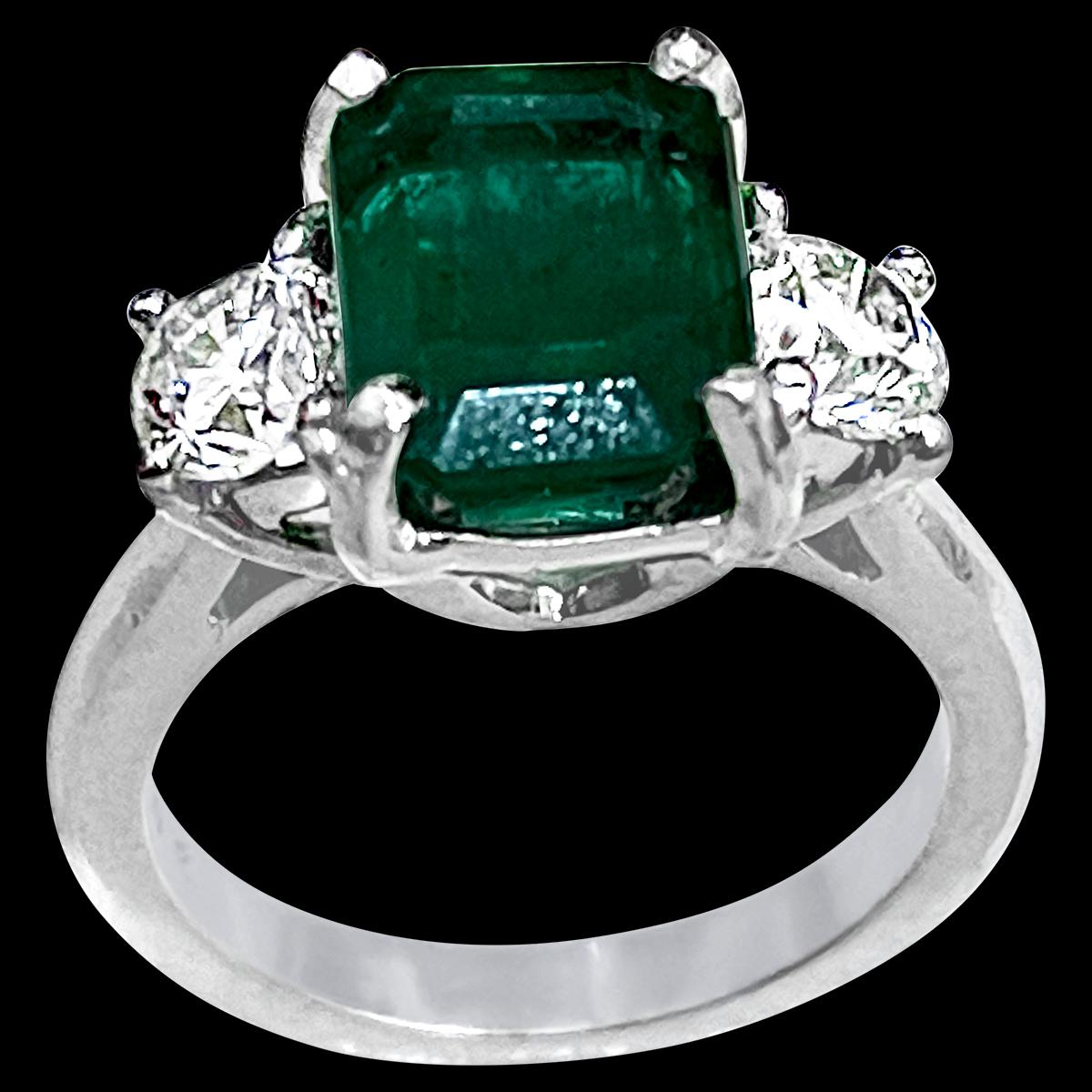 
3.6 Carat Emerald Cut  Emerald and 1.06 Carat Diamond Ring Platinum Size 6
A classic design  ring 
Approximately 3.6 Carat  Emerald Cut Emerald Absolutely gorgeous emerald , Very desirable color 
Platinum 9.5 gm
 Diamonds:  1.06  Carat as each