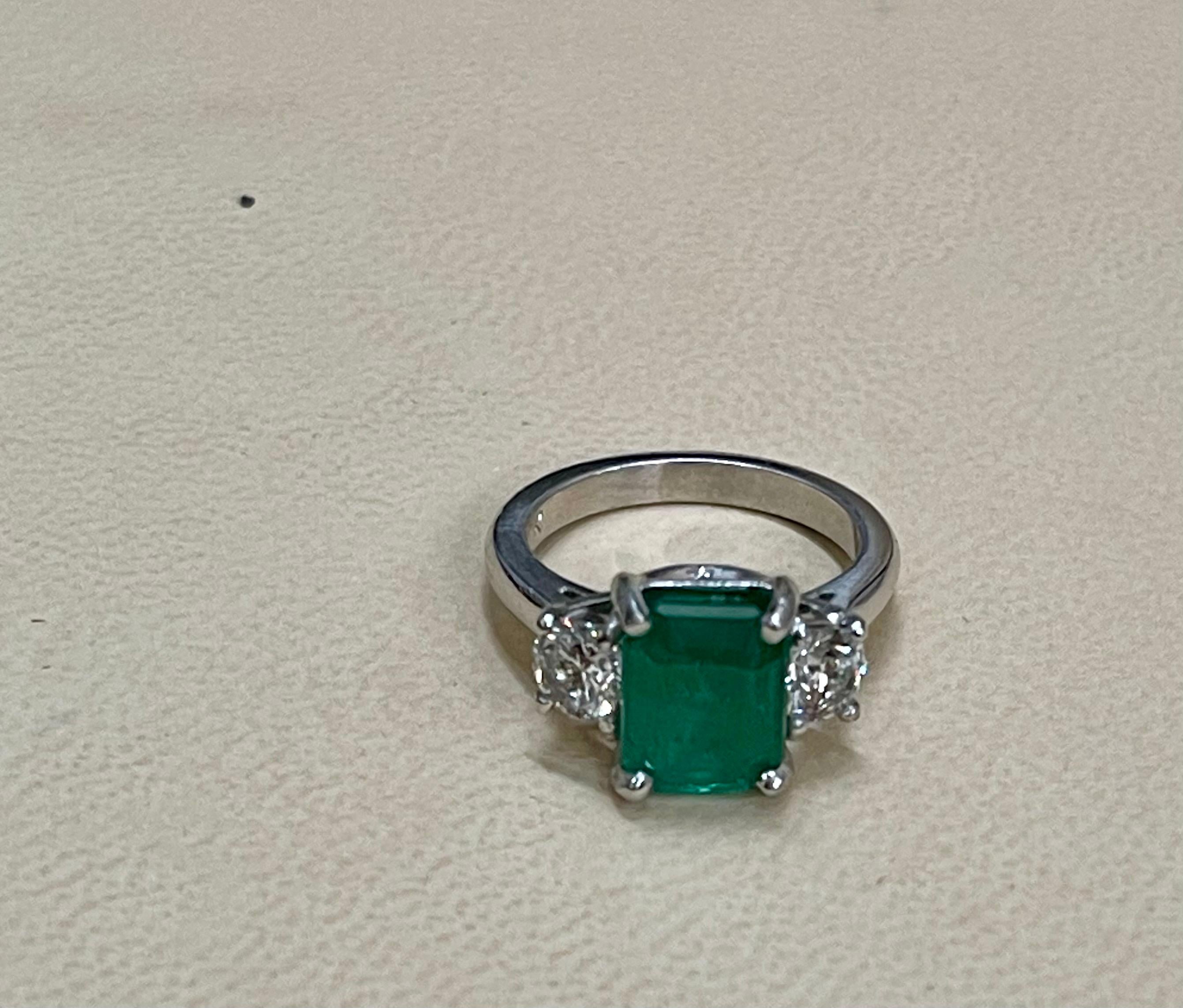 3.6 Carat Emerald Cut Emerald and 1.06 Carat Diamond Ring Platinum 3