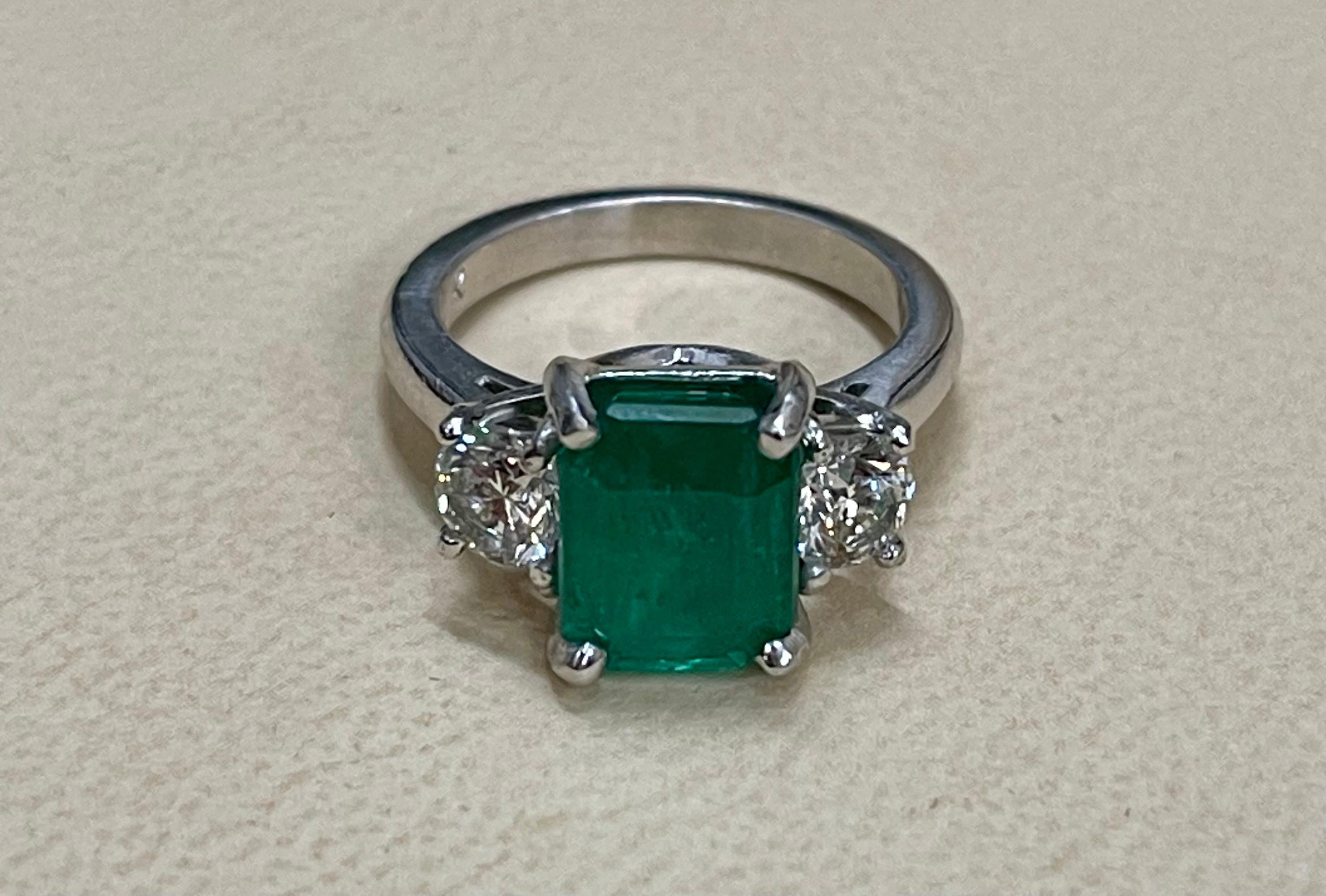 3.6 Carat Emerald Cut Emerald and 1.06 Carat Diamond Ring Platinum 5