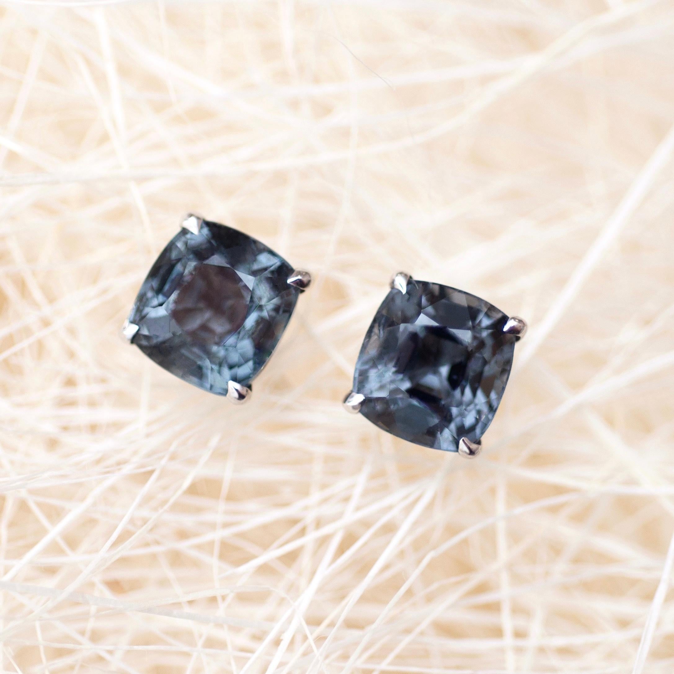 This spinel is looking like thunderstorm just above the sea, when the dark stormy sky with grey clouds is reflected in the water.
This white gold stud earrings with a small part of a stormy sky will become
your favorite every day jewelry.
This