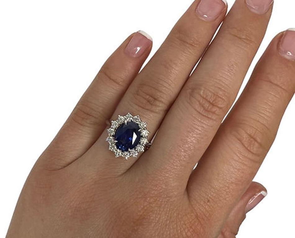 Sapphire Weight: 3.66 CTs, Measurements: 10x6 mm, Diamond Weight: 0.68 CTs (2mm), Metal: 18K White Gold, Gold Weight: 4.52 gm, Ring Size: 7, Shape: Oval, Color: Blue, Hardness: 9, Birthstone: September