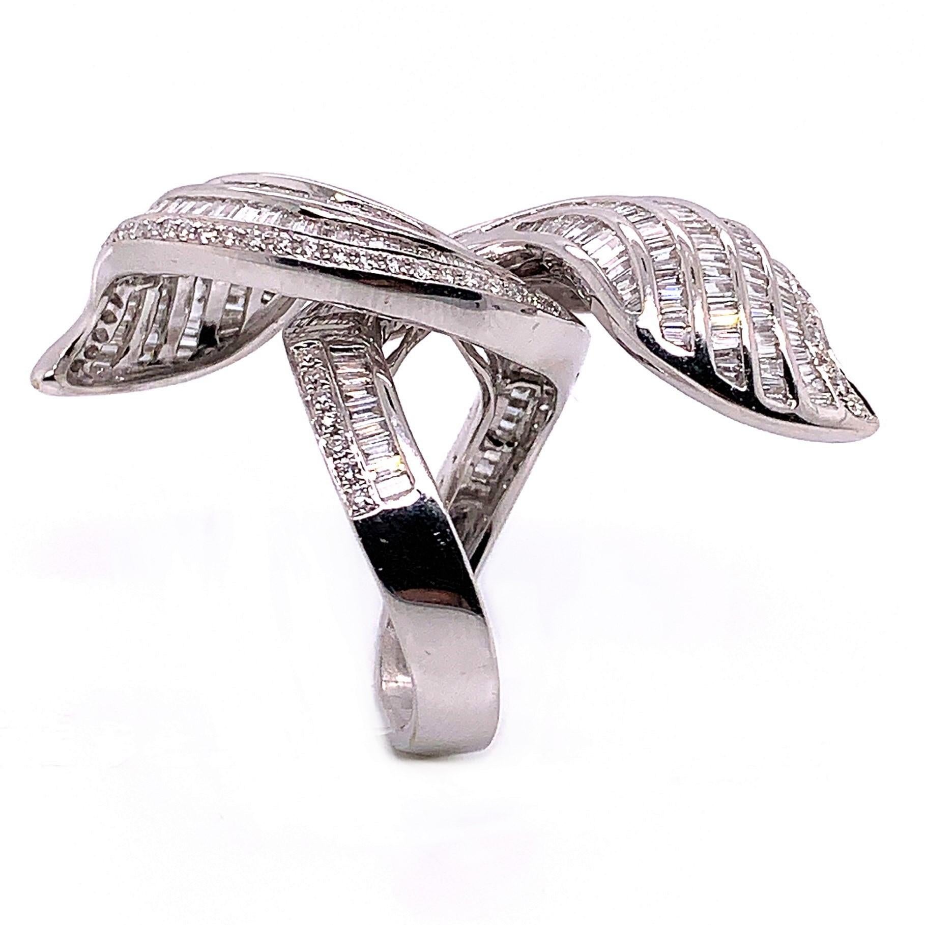 3.6 Carat Twirling Baguette Diamond Ring Crafted in 18 Karat White Gold In New Condition In New York, NY