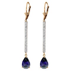 Boucles d'oreilles pendantes en or rose avec saphir et diamant de 3,6 ct.