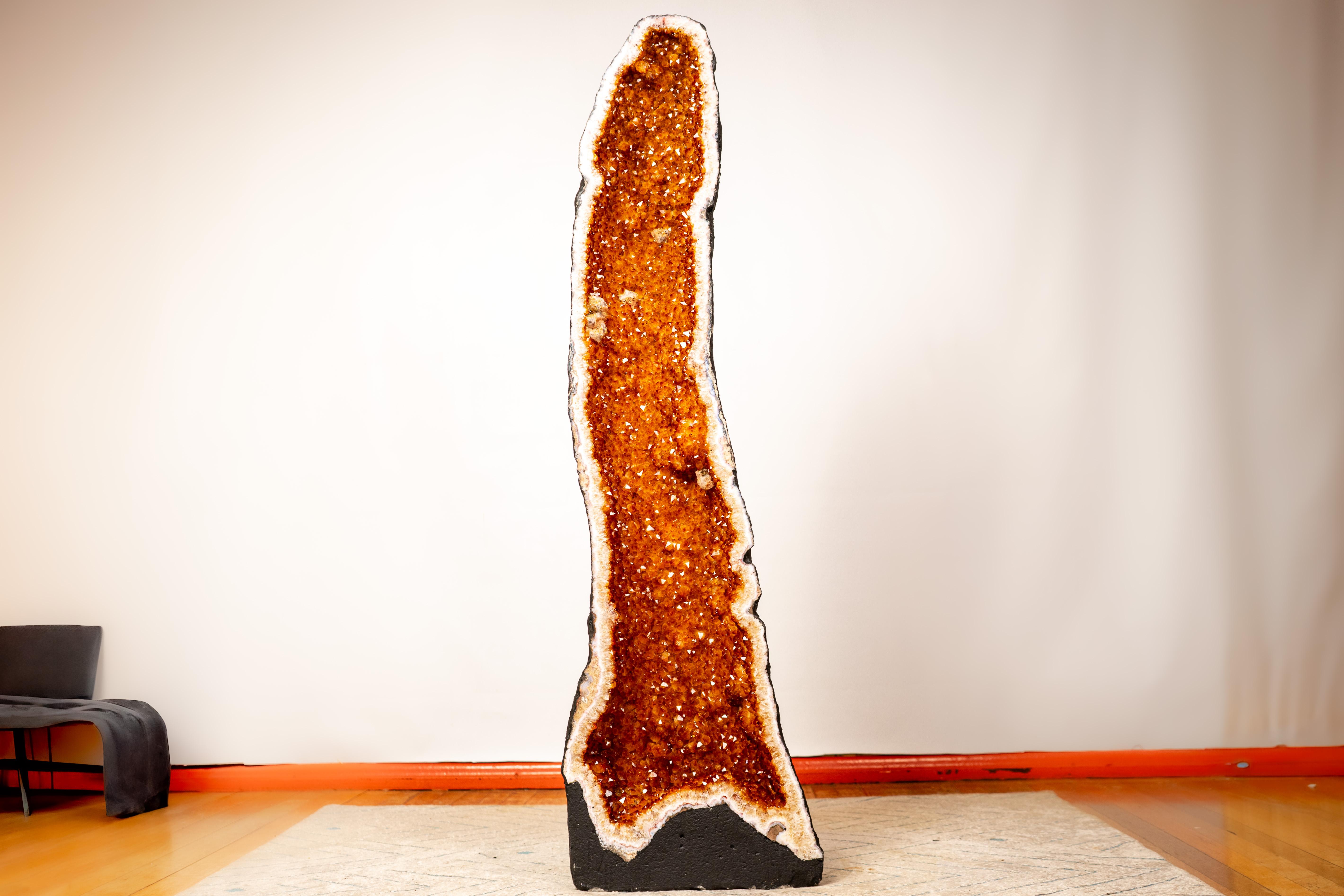 Tall Citrine Geode with Slim, Straight Formation and Sparkly Orange Druzy

▫️ Description ▫️ 

From time to time, nature outdoes itself—here, in the form of a sculptural citrine geode. Displaying a stunning golden-orange druzy in a tall, cathedral