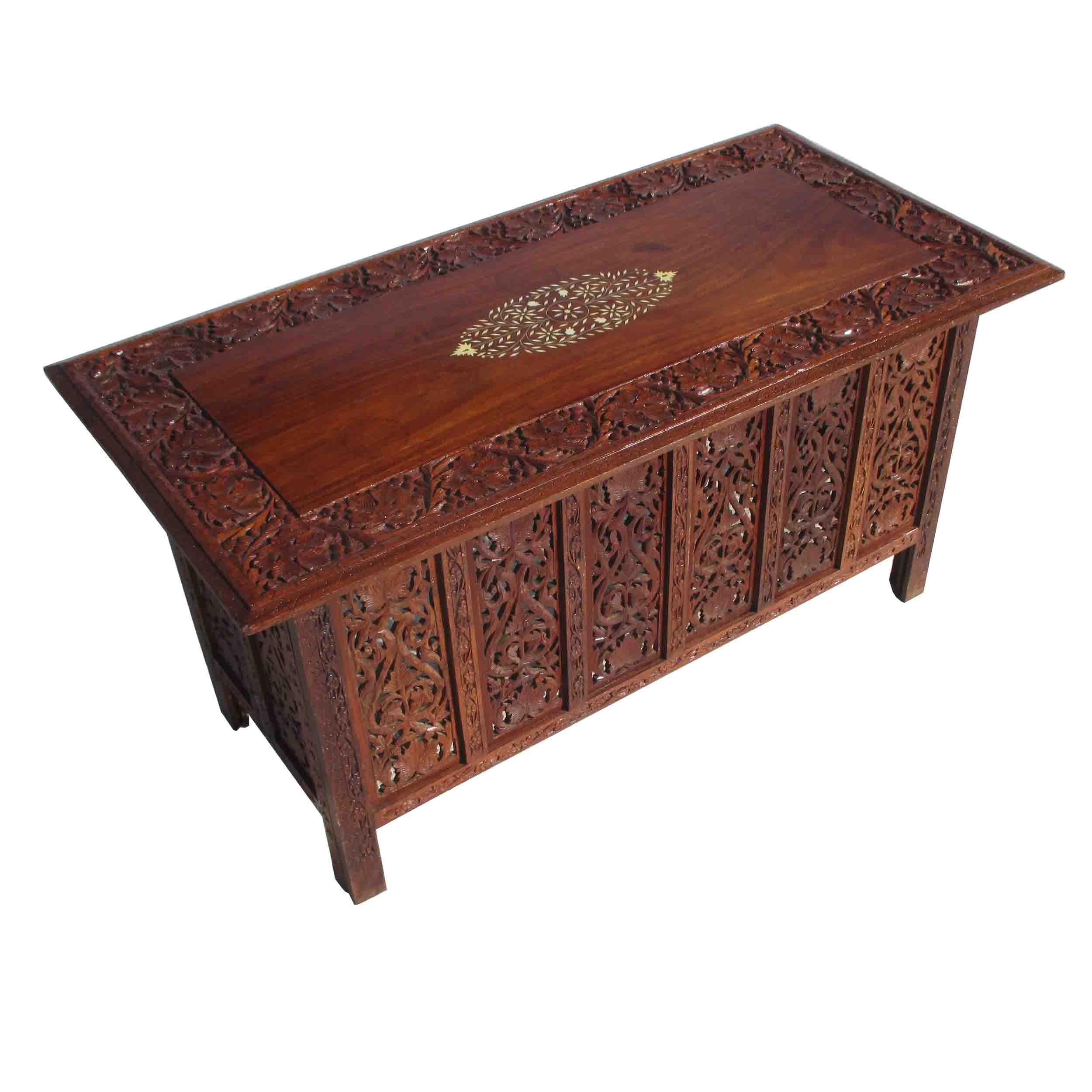 Indonesian fret work alter console table

Intricately carved teak table that folds down for portability. Mother of pearl inlay on table top.

Measures: 36