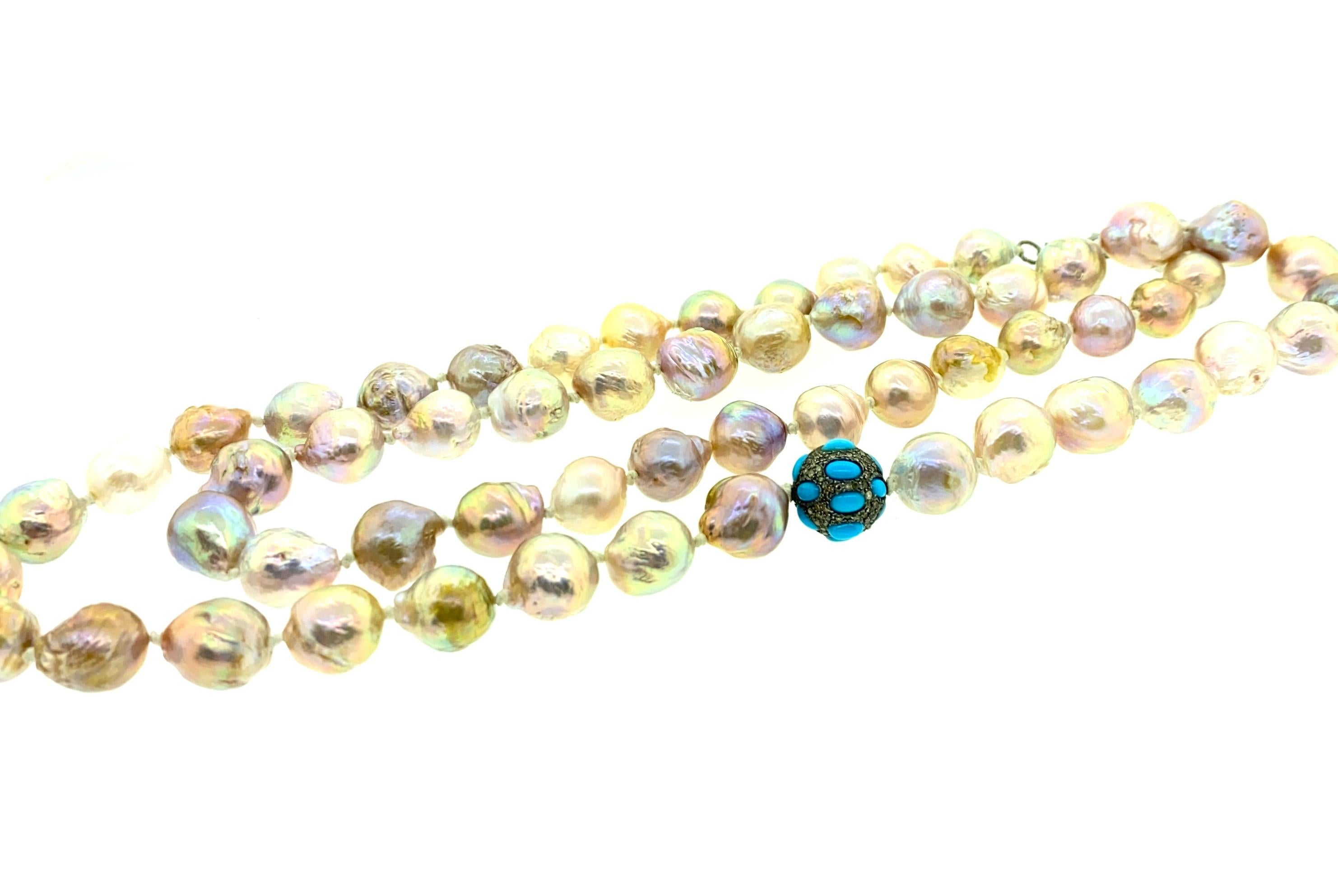 36 Inch Long 730 ct Pearl, 2.72 ct Turquoise , 0.86 ct Champagne Diamond Thread Knotted Necklace with Silver Lobster Clasp. Each Freashwater Pearl has been hand knotted using white thread and also has one Champagne diamond and turquoise bead falling