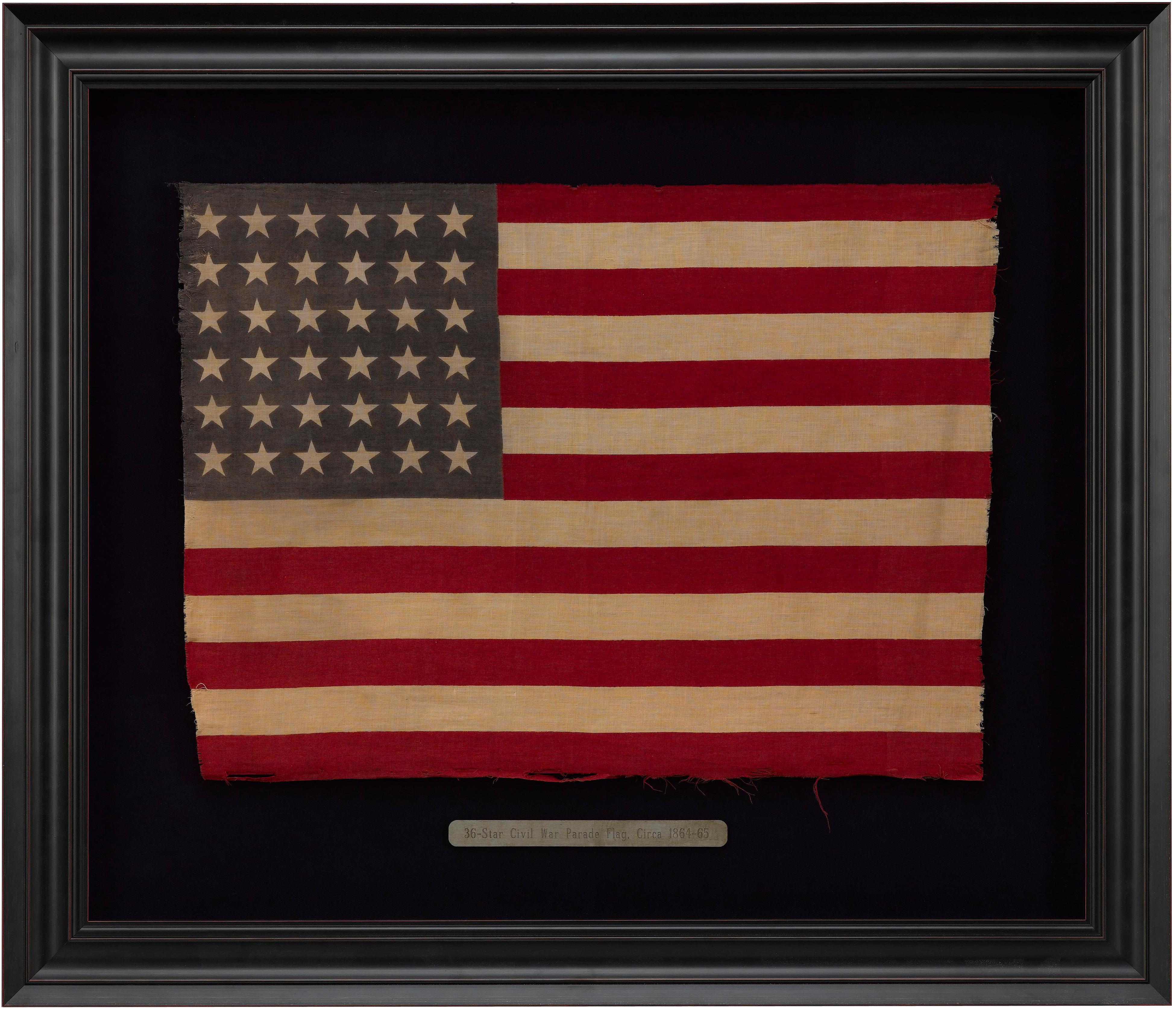 This is a 36-star antique flag, as striking as it is scarce. 36 stars celebrate the addition of Nevada to the Union and officially flew from July 4, 1865 to July 3, 1867, under President Andrew Johnson. The 36 stars are printed in a standard row