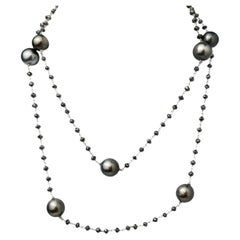 Collana da 36" con perle di Tahiti e diamanti neri naturali (38,00ct) in oro bianco 14K