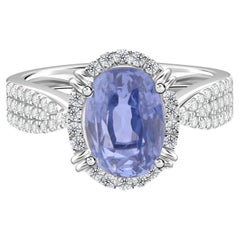 3.60 Carat Blue Sapphire 0.38 Carat SI/H Diamond Ring 18 Karat White Gold