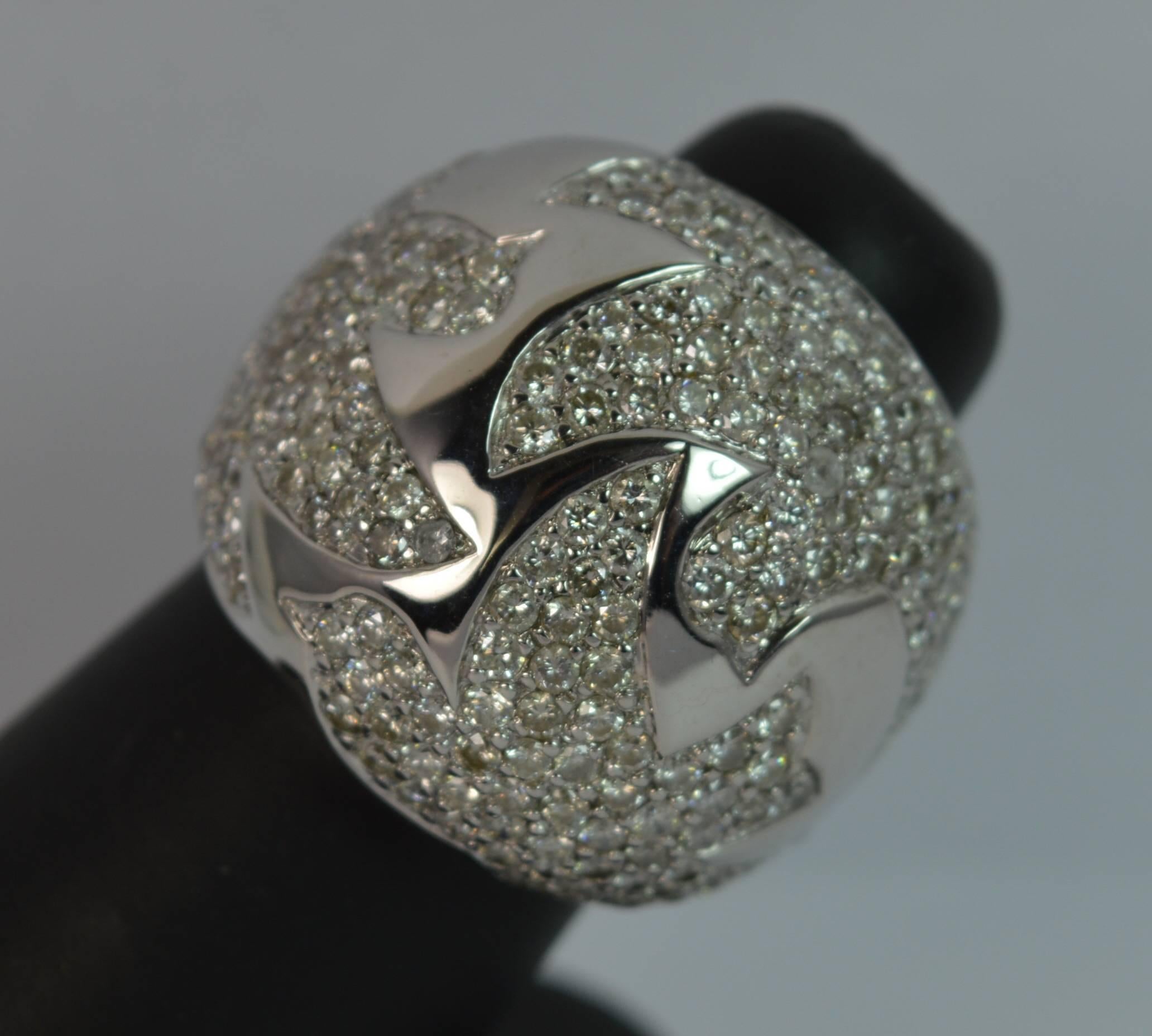 
A very impressive diamond cluster or cocktail ring.

​Set with 180+ round cut natural diamonds to total approximately 3.60 carats.

​They are set into a three sections which make three swallow birds.

All set into a heavy and solid 18 carat white
