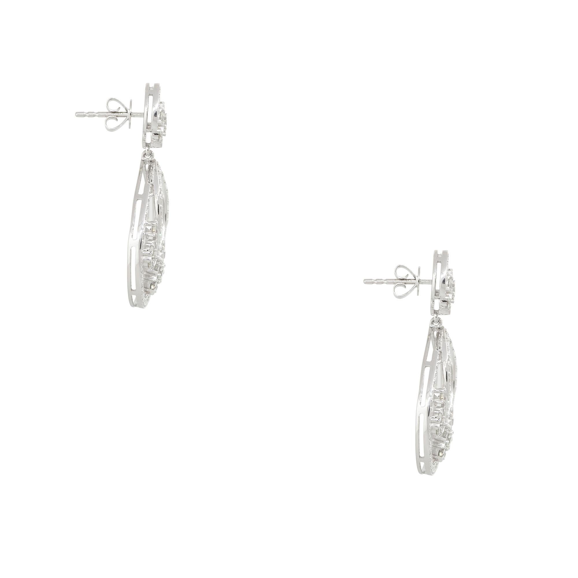 3.60 Carat Diamond Drop Pear Shaped Flower Earrings 14 Karat in Stock In Excellent Condition For Sale In Boca Raton, FL