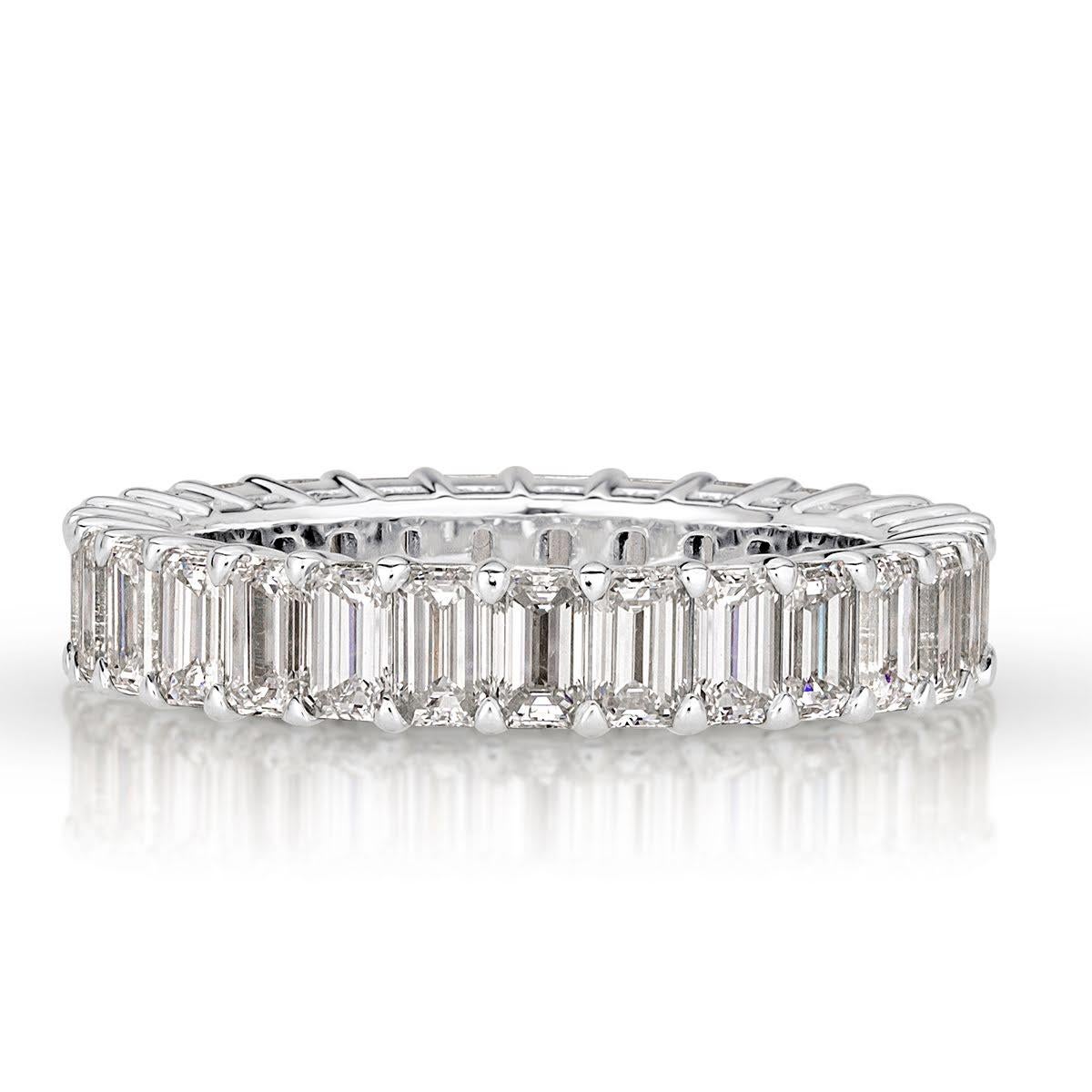 Handcrafted in high polish platinum, this stunning emerald cut diamond eternity band showcases 3.60ct of perfectly matched emerald cut diamonds graded at E-F in color, VVS2-VS1 in clarity. All eternity bands are shown in a size 6.5. We custom craft