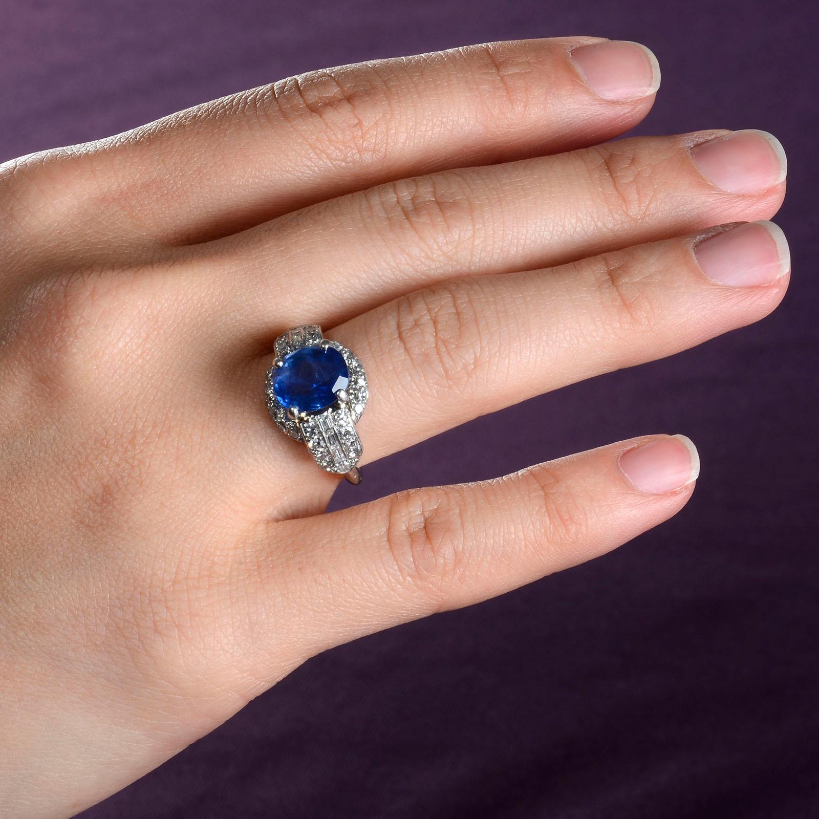 Oval Cut 3.60 Carat Oval Sapphire and Diamond Platinum Ring For Sale