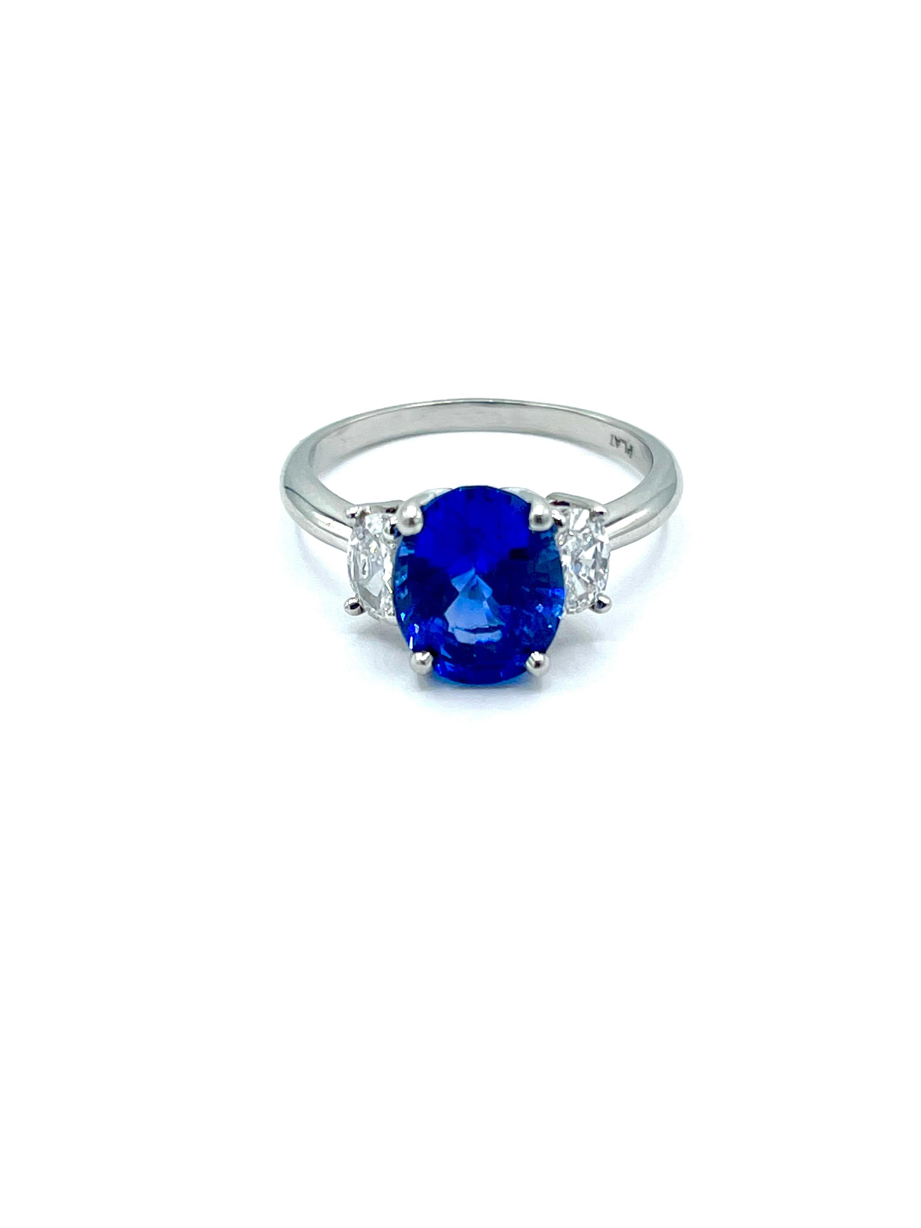 Modern 3.60 Carat Oval Sapphire and Oval Diamond Three Stone Platinum Ring