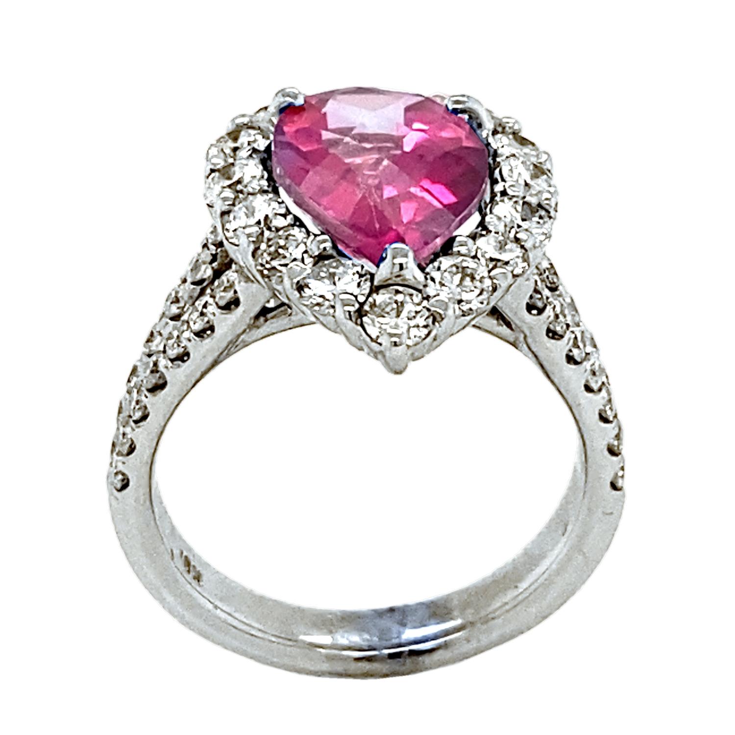 A beautiful color 3.60 Ct Pear Shaped Pink Topaz center with proper proportions set in gorgeous 18k gold Pave set Engagement Ring with Halo with total diamond weight of 1.40 Ct. on the side. 

Center stone: 3.60 Ct Pear shape Pink Topaz
Side stones: