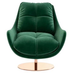 Fauteuil pivotant à 360 degrés, tapissé de velours et base dorée polie