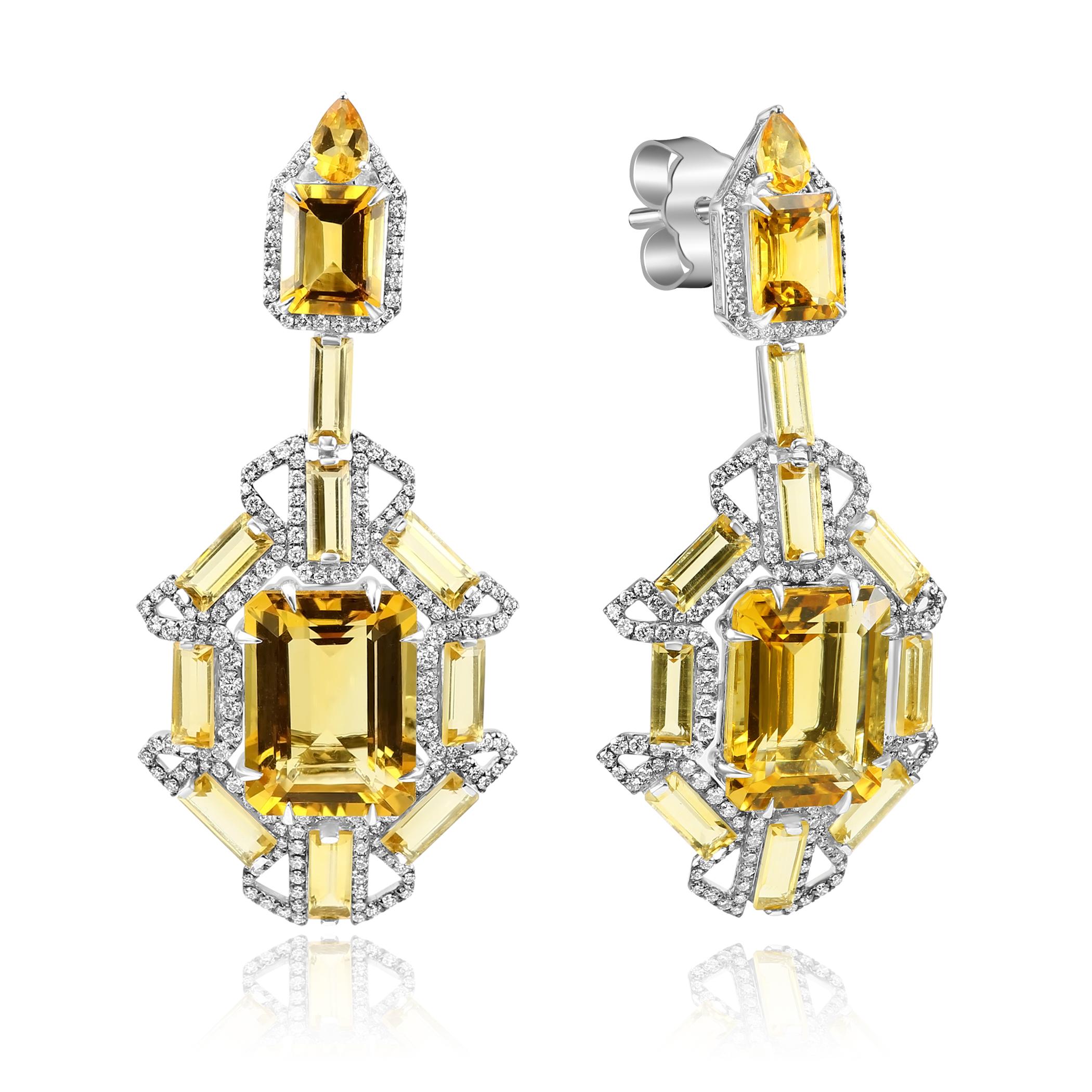 Ces étonnantes boucles d'oreilles pendantes en or blanc 18 carats rayonnent de chaleur et d'élégance. Elles sont composées de citrines vibrantes, taillées en émeraude, et de diamants blancs brillants. Ce design accrocheur respire le luxe et le