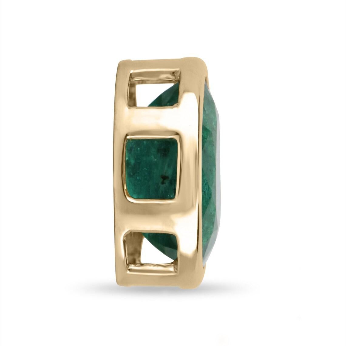 A bold 3.60-carat natural oval emerald solitaire, bezel pendant that can be worn East to West or North to South! This is quite an alluring piece with an incredible emerald as the center of attention. The center gemstone is a good quality earth-mined