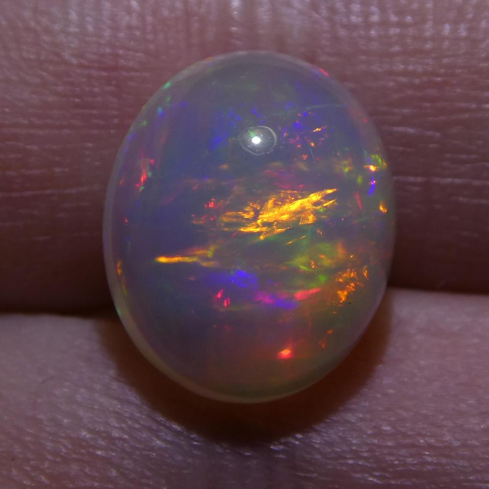 Description:

 

Gem Type: Opal
Number of Stones: 1
Weight: 3.6 cts
Measurements: 12.10x10.07x6.10 mm
Shape: Oval Cabochon
Cutting Style Crown: Cabochon
Cutting Style Pavilion:
Transparency: Translucent
Clarity: Translucent
Colour: Crystal base with