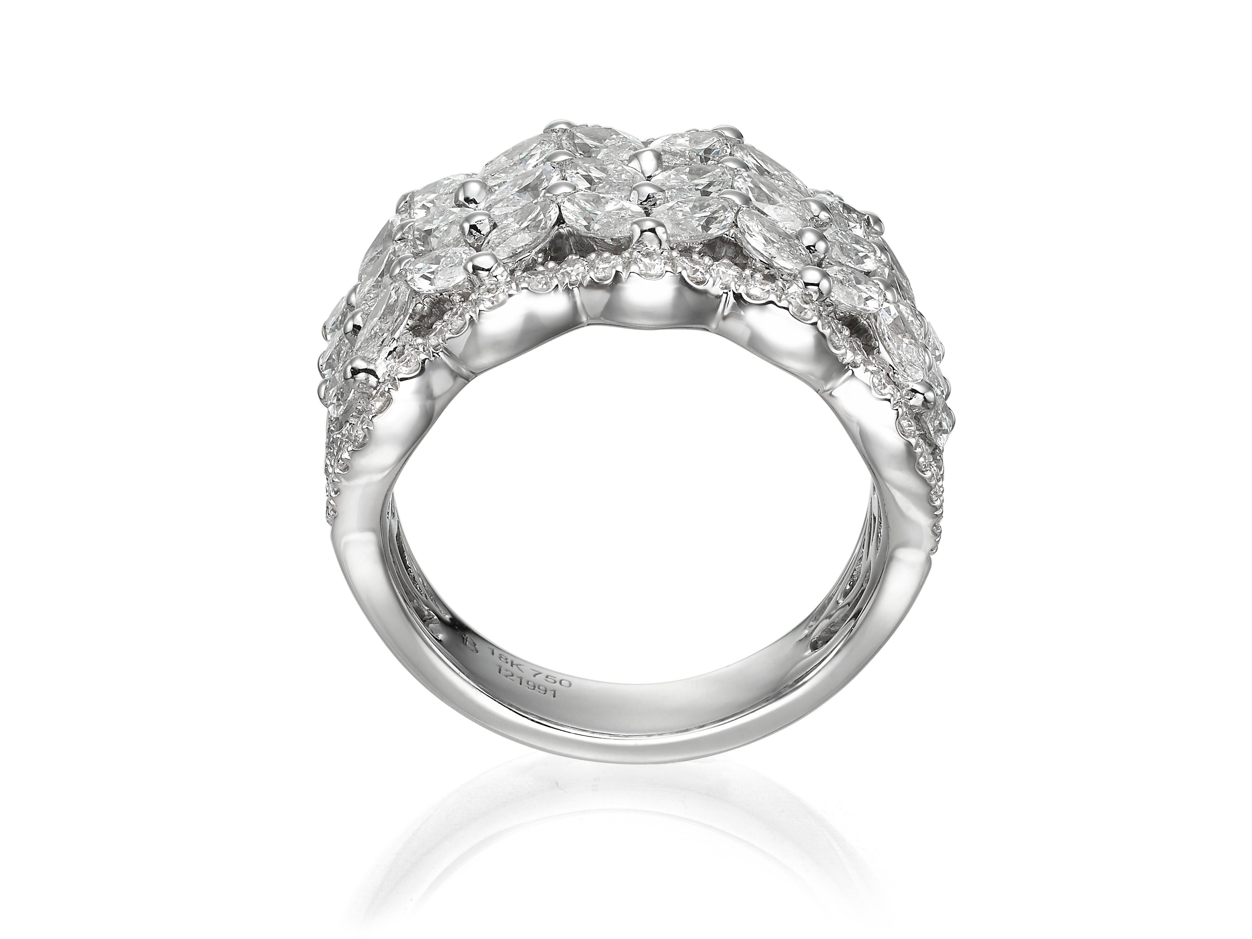 Handmade from 18K white gold, encrusted with 2.78 carats of marquise shape diamonds and 0.83 carats of round brilliant cut diamonds.  An elegant choice for a bride and perfectly complements the Butani 6.24 Carat Marquise and Round 18 Karat White