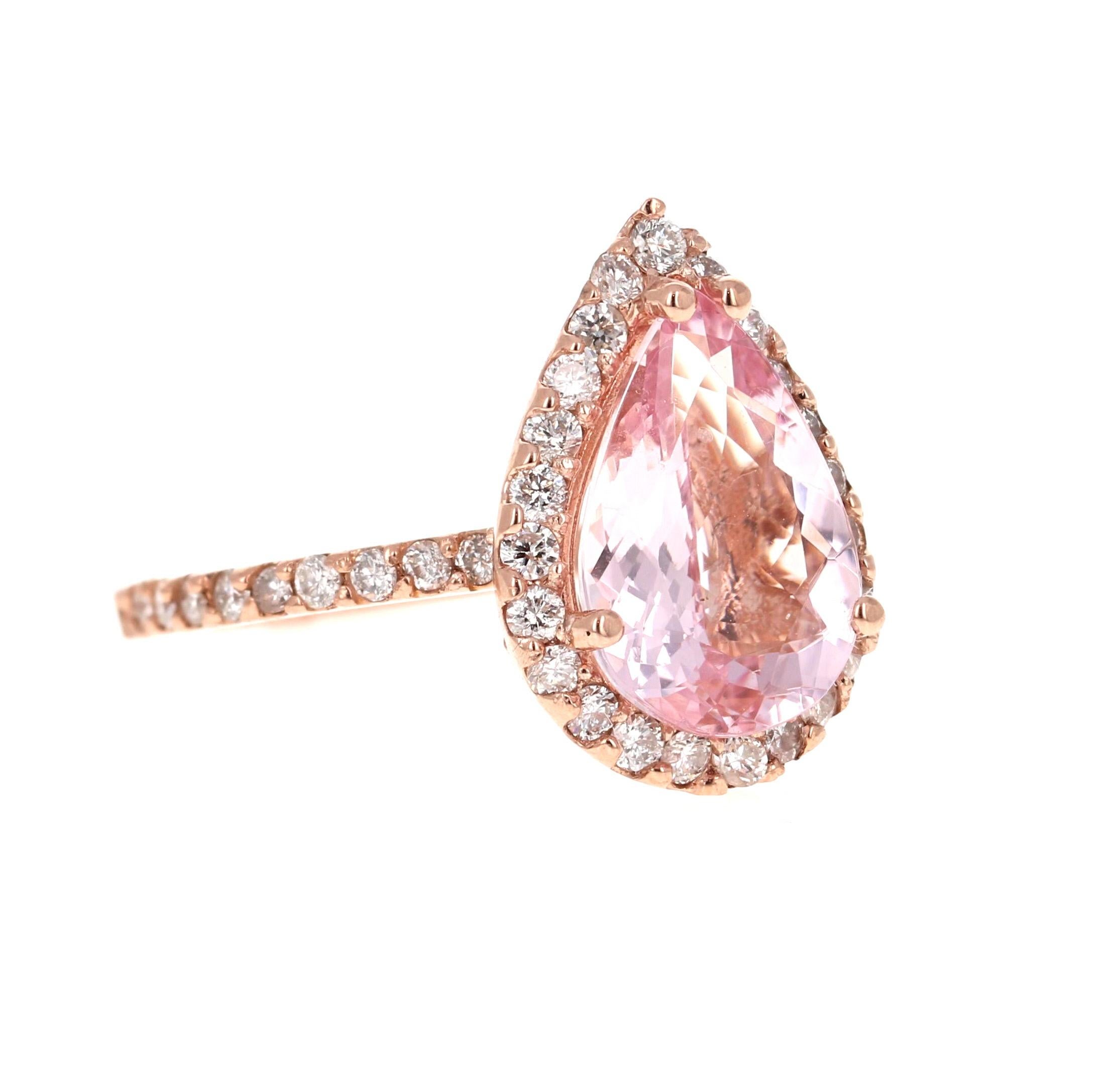 A lovely Engagement Ring Option or as an alternate to a Pink Diamond Ring! A Stunning Statement. 

This gorgeous and classy Morganite Diamond Ring has a 2.85 Carat Pear Cut Pink Morganite and has a Halo of 44 Round Cut Diamonds that weigh 0.76carats