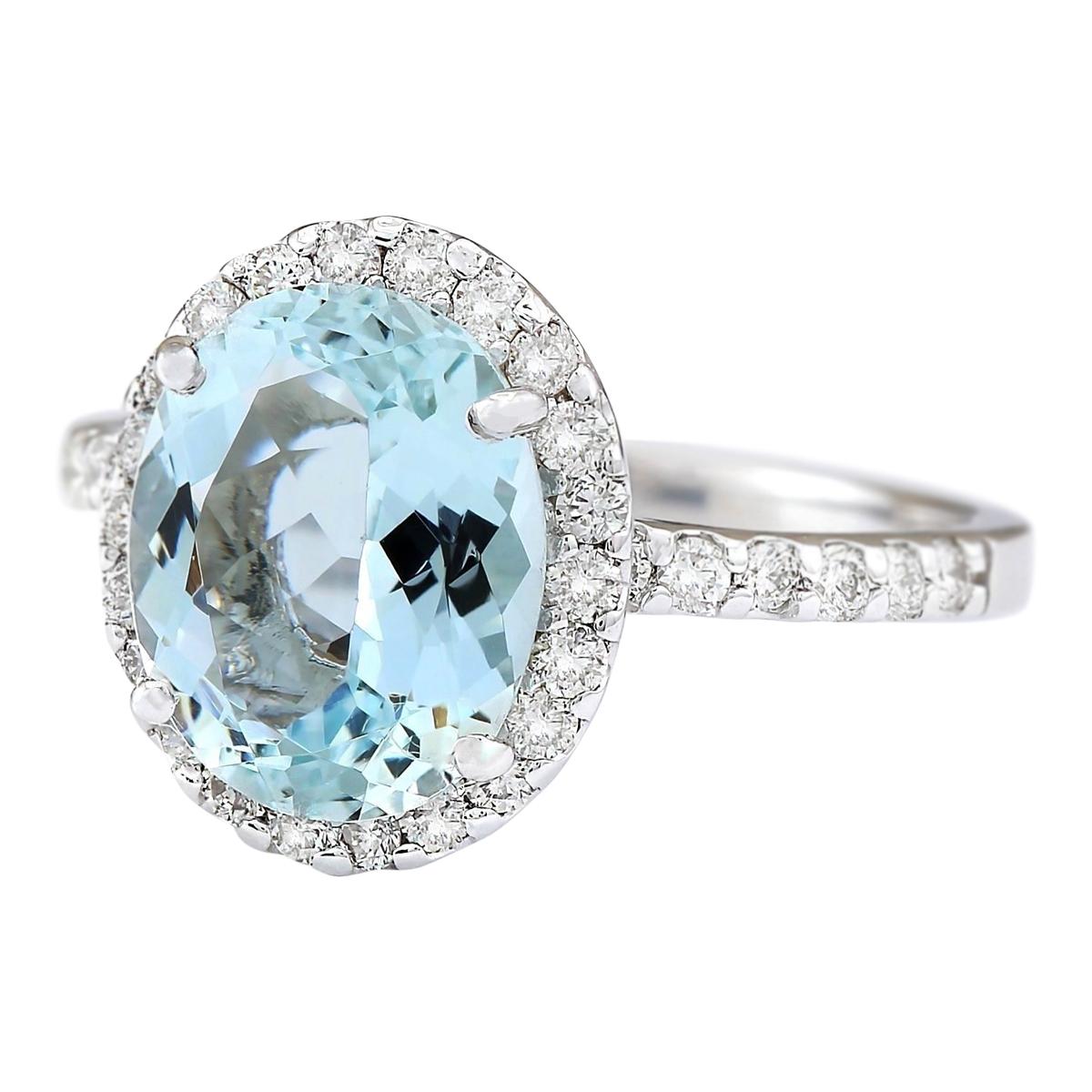Stamped: 14K White Gold
Total Ring Weight: 3.7 Grams
Total Natural Aquamarine Weight is 3.01 Carat (Measures: 11.00x9.00 mm)
Color: Blue
Total Natural Diamond Weight is 0.60 Carat
Color: F-G, Clarity: VS2-SI1
Face Measures: 13.60x11.50 mm
Sku: