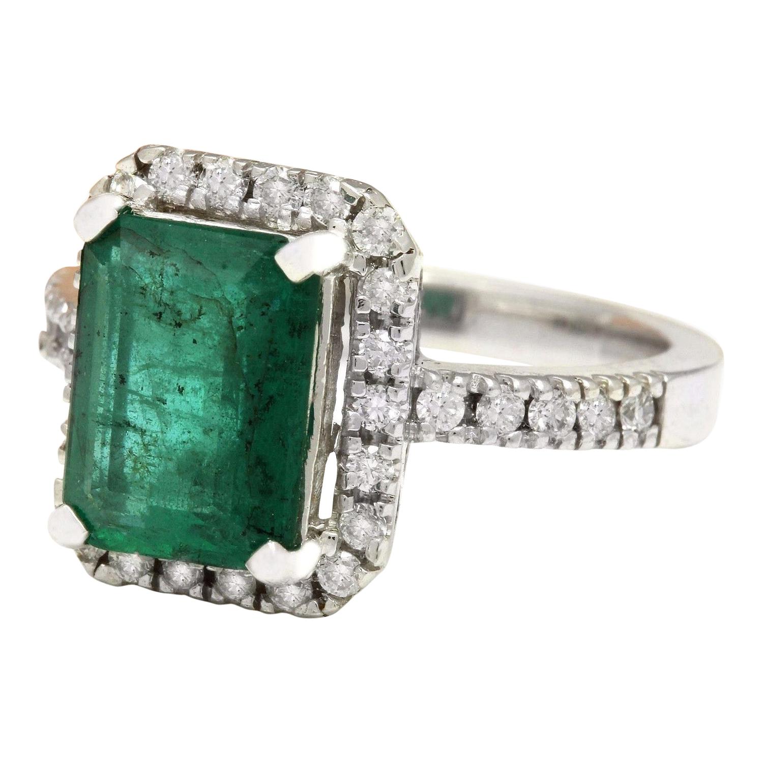 3.61 Carat Natural Emerald 14K Solid White Gold Diamond Ring
 Item Type: Ring
 Item Style: Engagement
 Material: 14K White Gold
 Mainstone: Emerald
 Stone Color: Green
 Stone Weight: 3.01 Carat
 Stone Shape: Emerald
 Stone Quantity: 1
 Stone