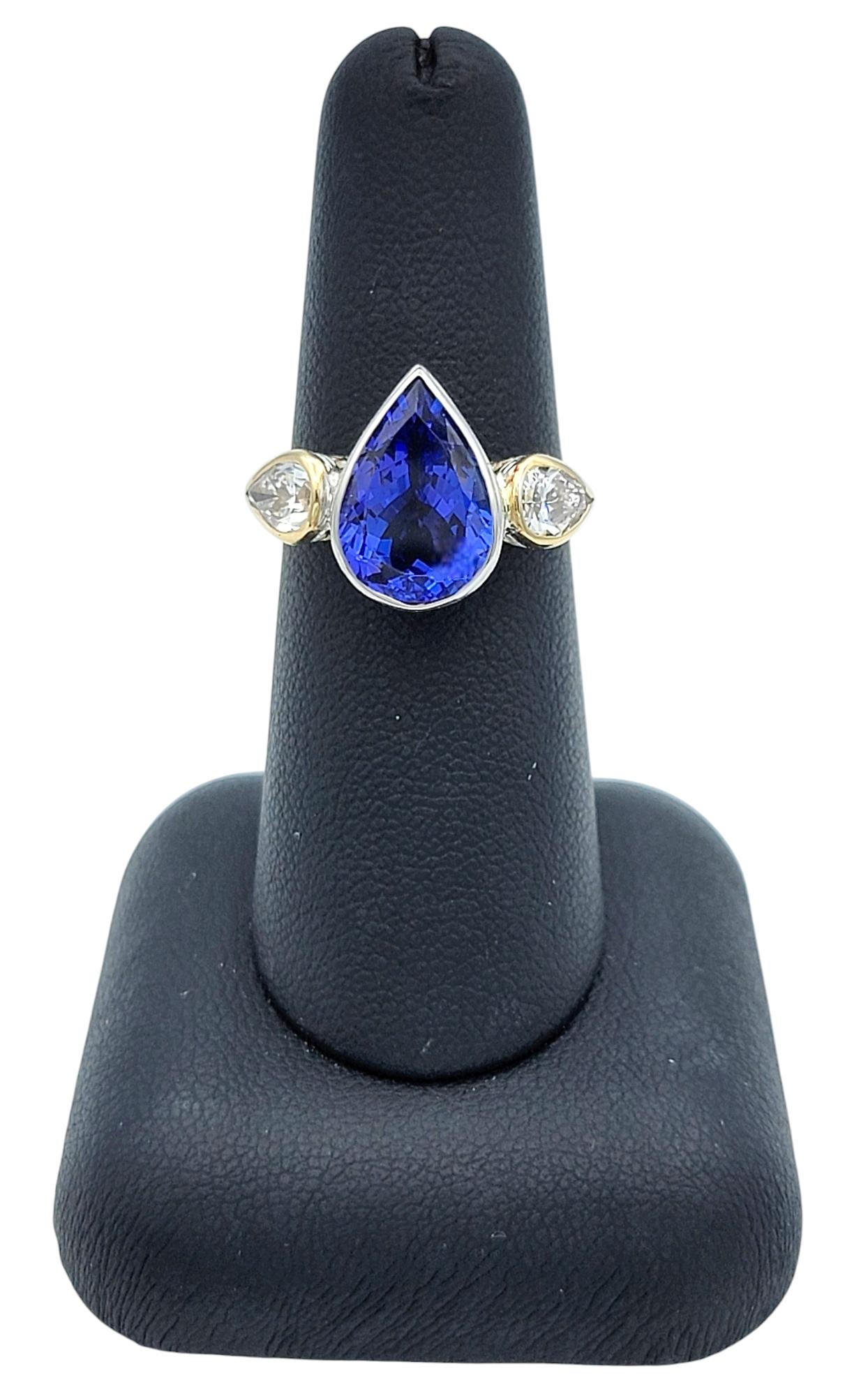 Anello a tre pietre con tanzanite e diamanti da 3,61 carati e taglio a pera in oro 18 carati in vendita 5